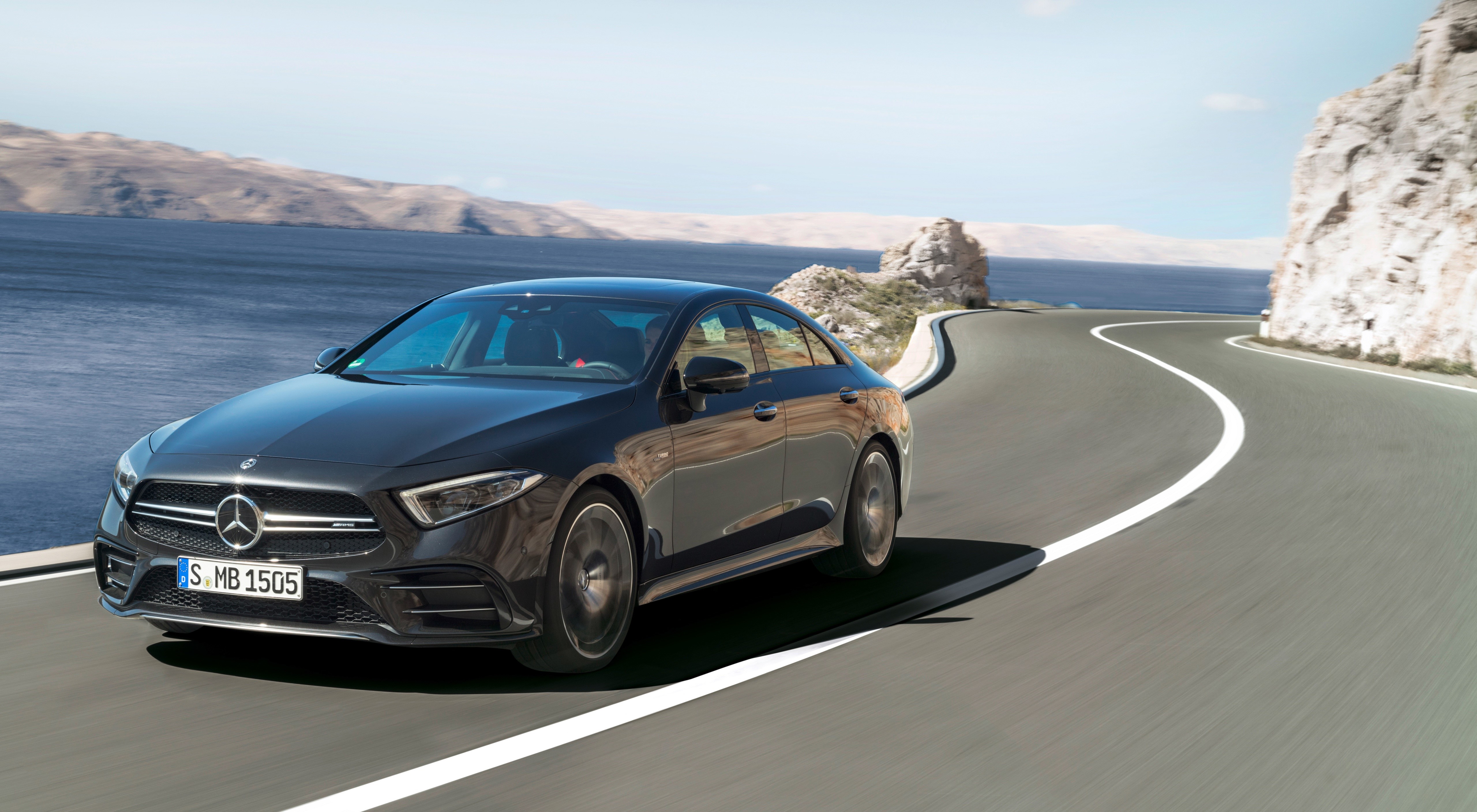 Mercedes-Benz CLS 53 4MATIC Sedan on a Coastal Road HD Wallpaper