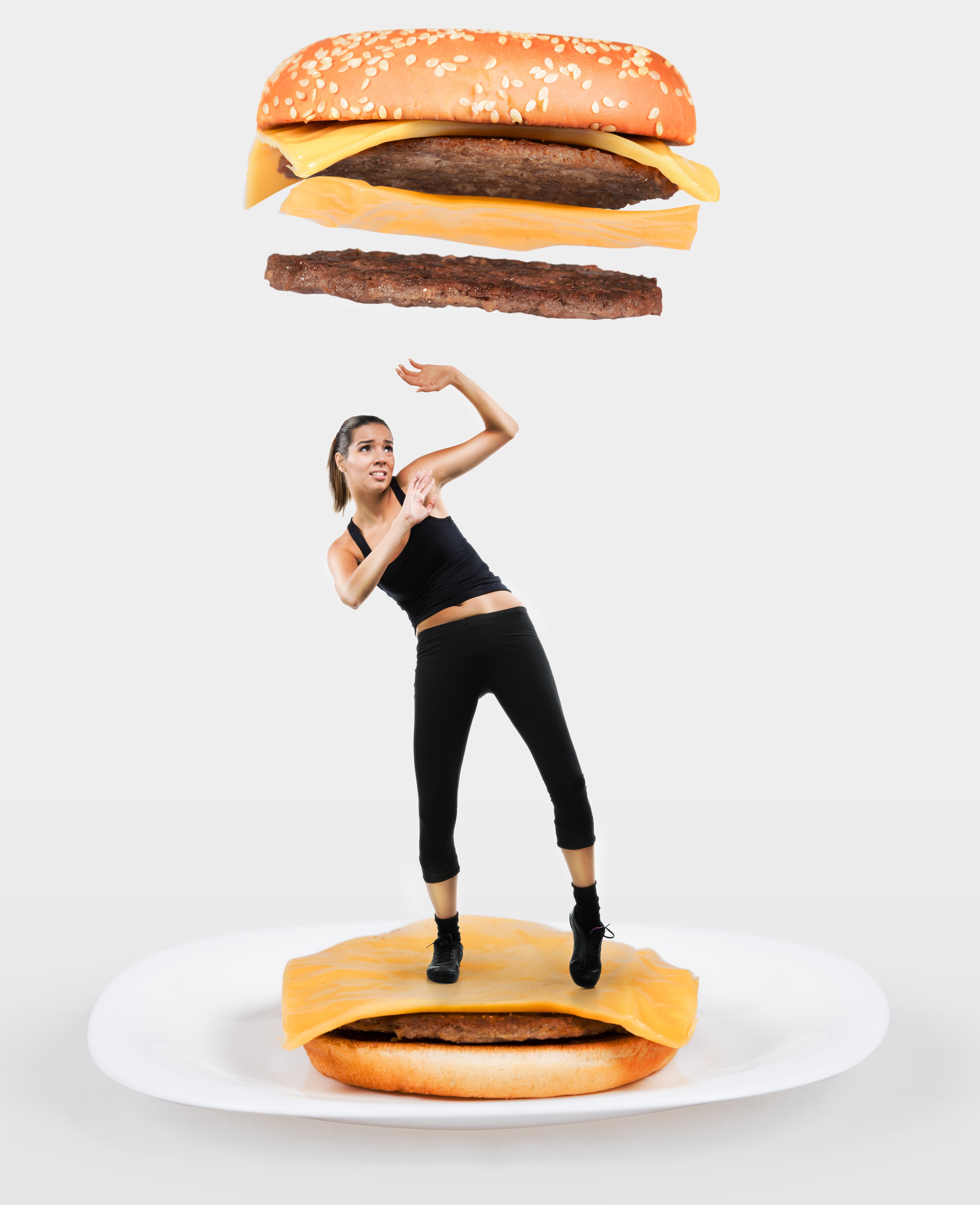 Woman on a hamburger plate with a floating hamburger HD Phone Wallpaper
