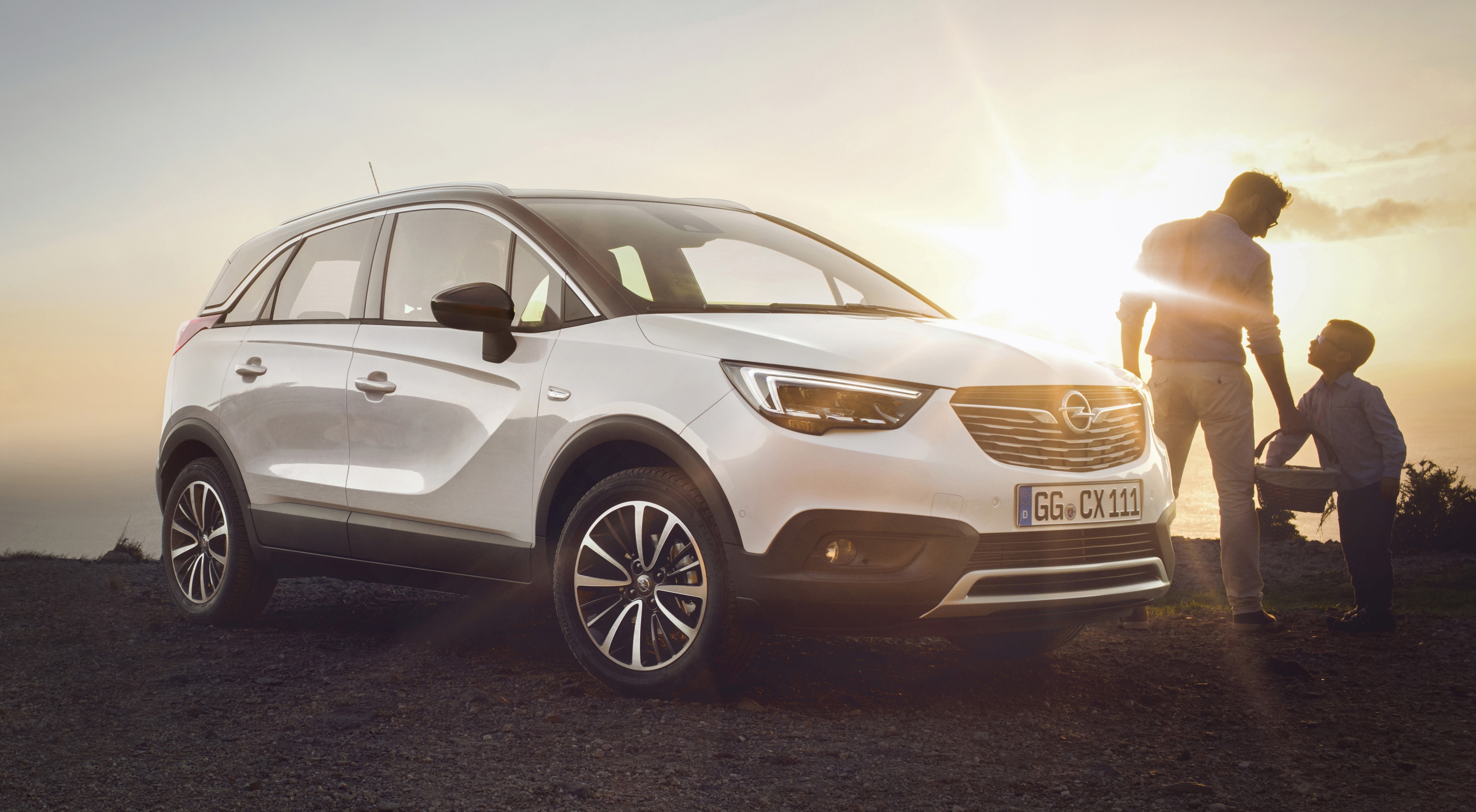White Opel Crossland X Crossover with Father and Son HD Wallpaper