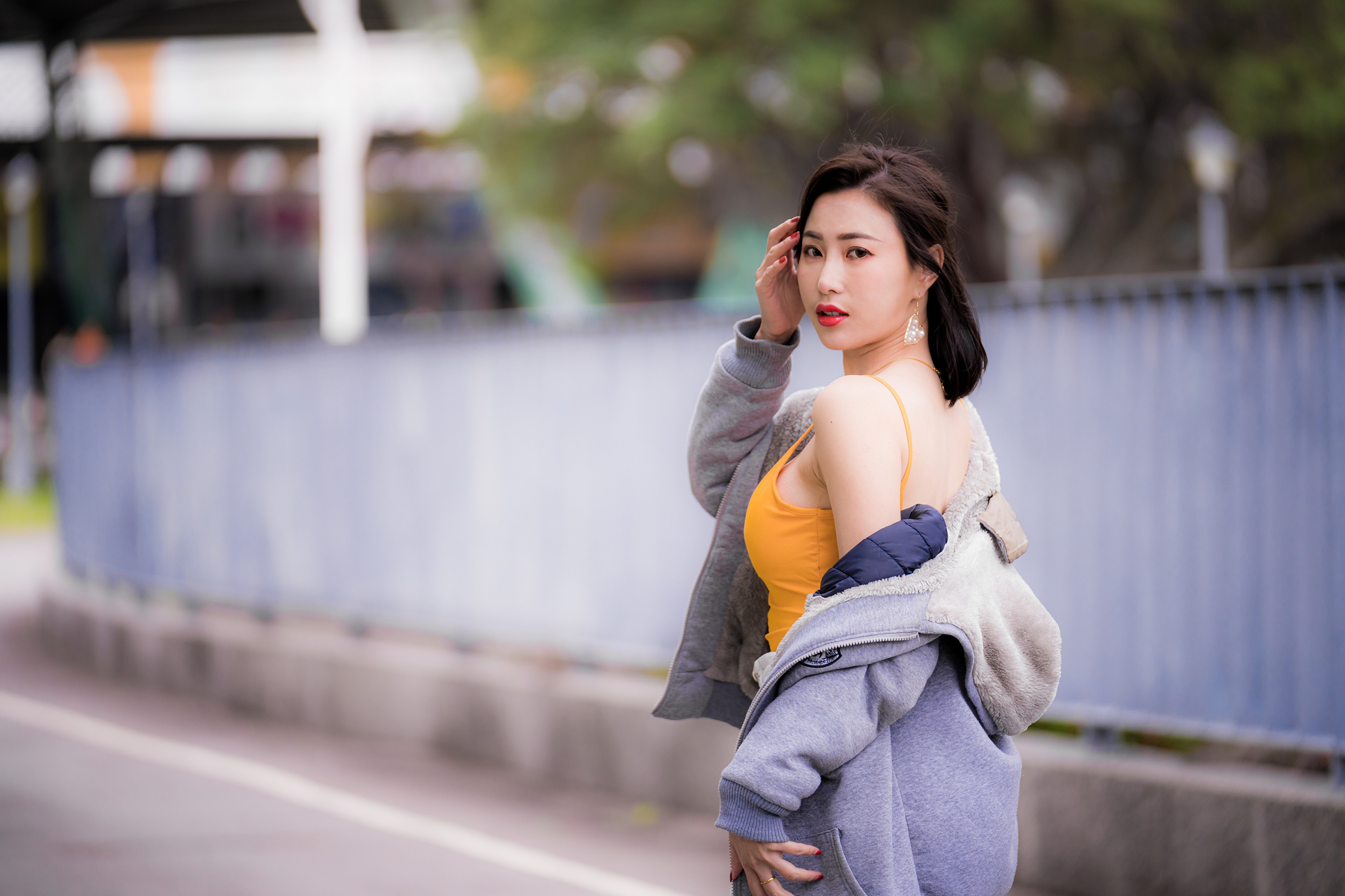 Asian woman in yellow singlet and jacket HD Wallpaper
