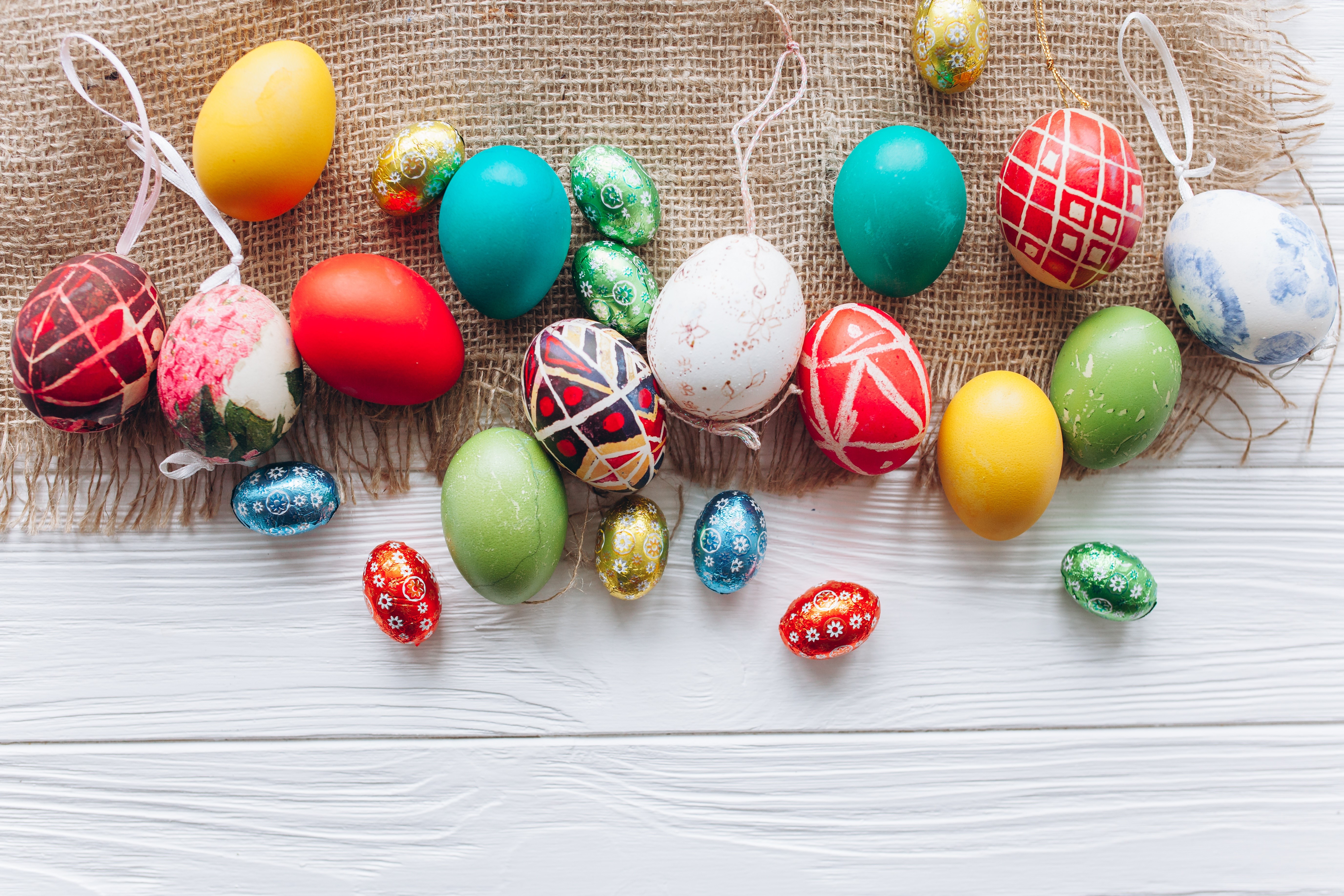 Easter Eggs on Burlap and White Wood Surface HD Wallpaper