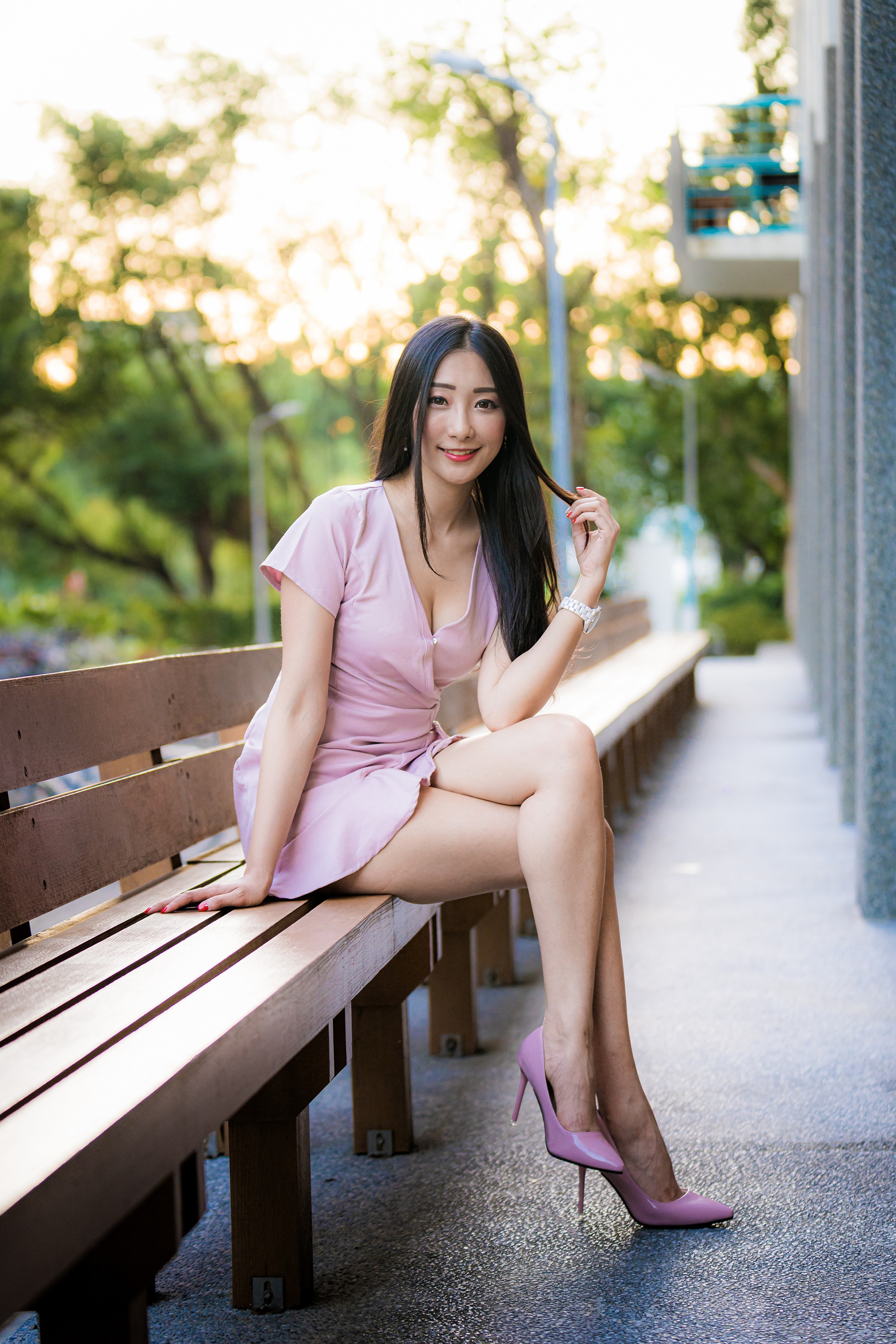 Asian Woman Sitting on Wooden Bench in Pink Dress HD Phone Wallpaper