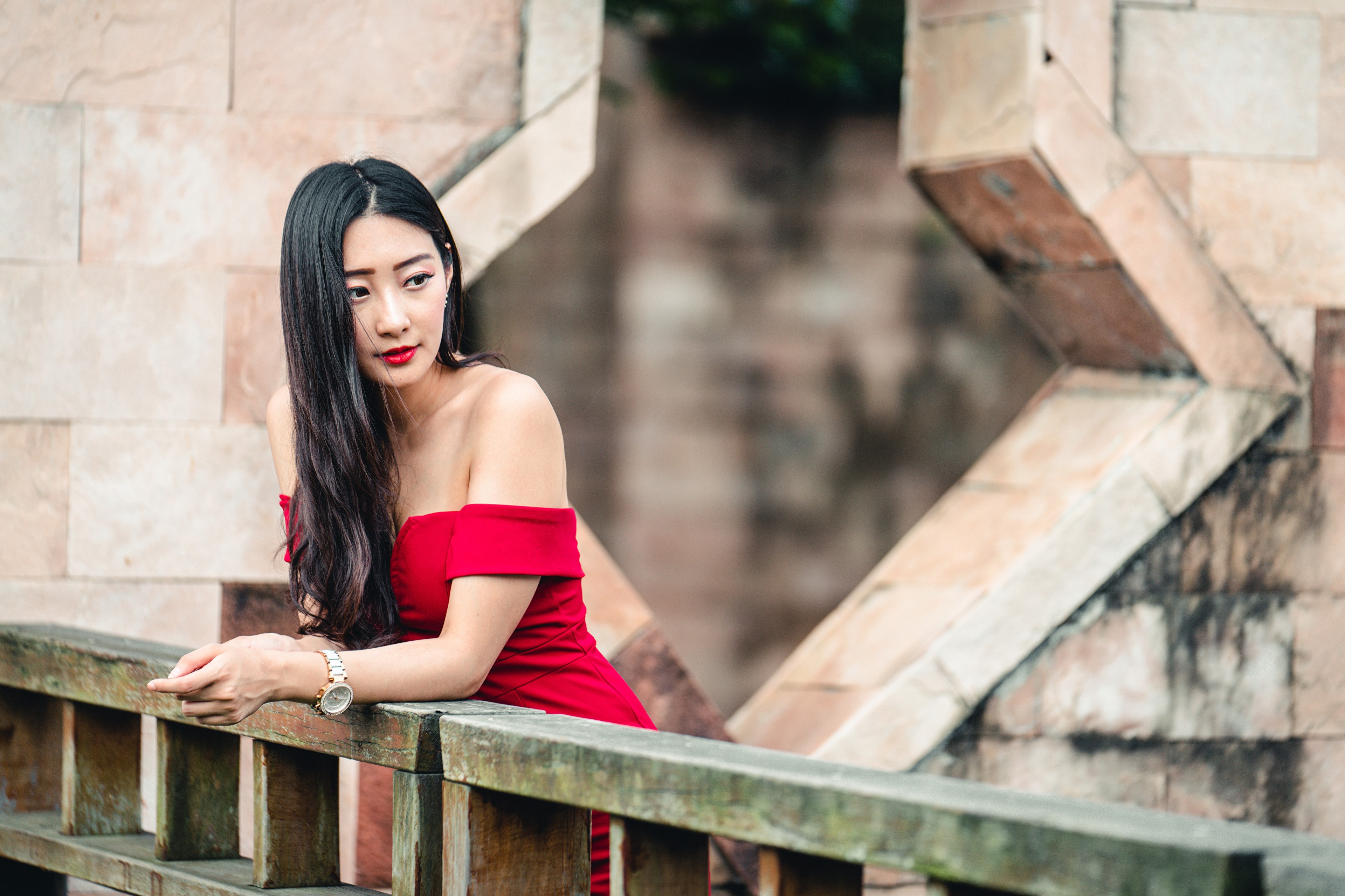 Brunette girl in red dress HD Wallpaper