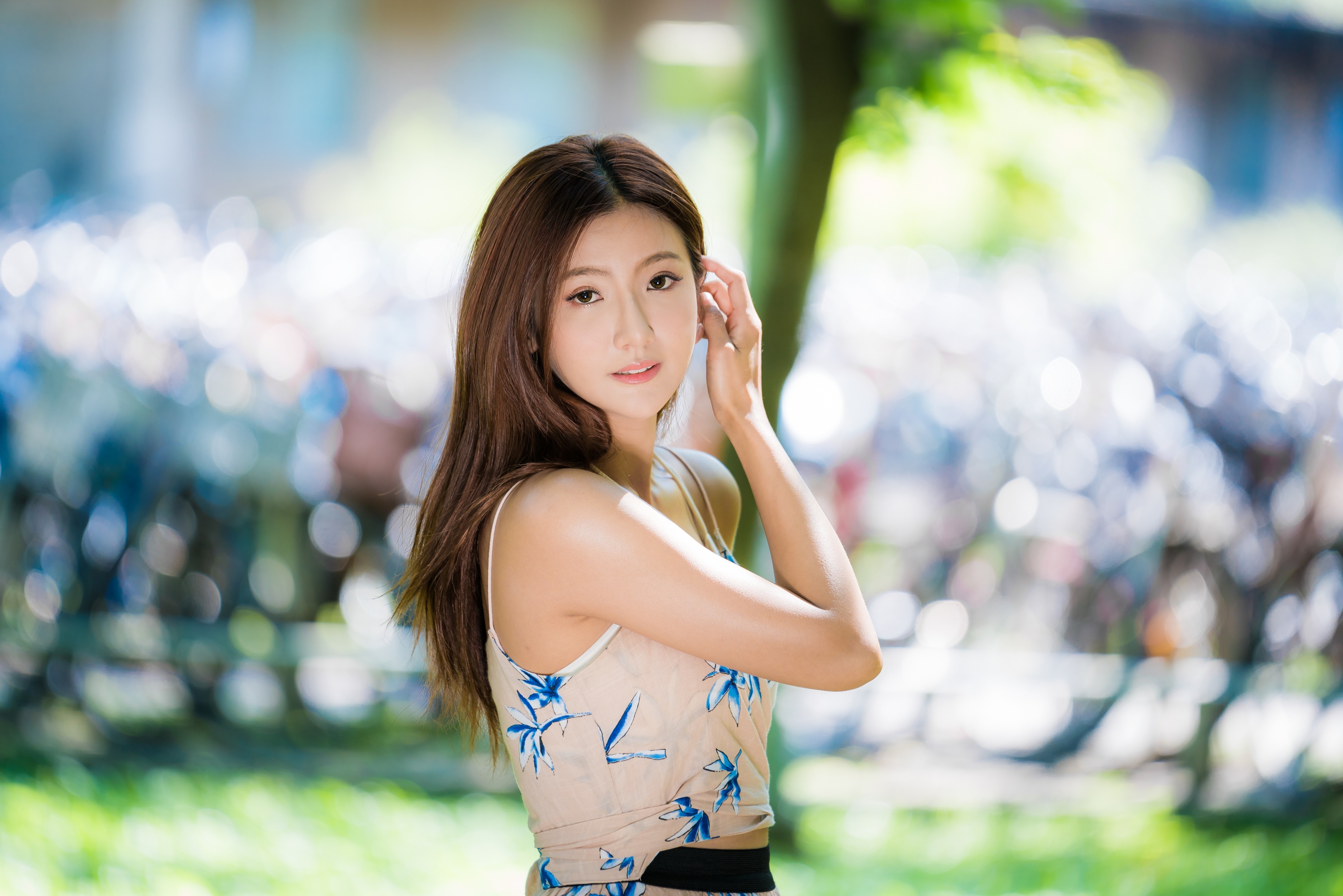 Asian woman with brown hair and floral top HD Wallpaper