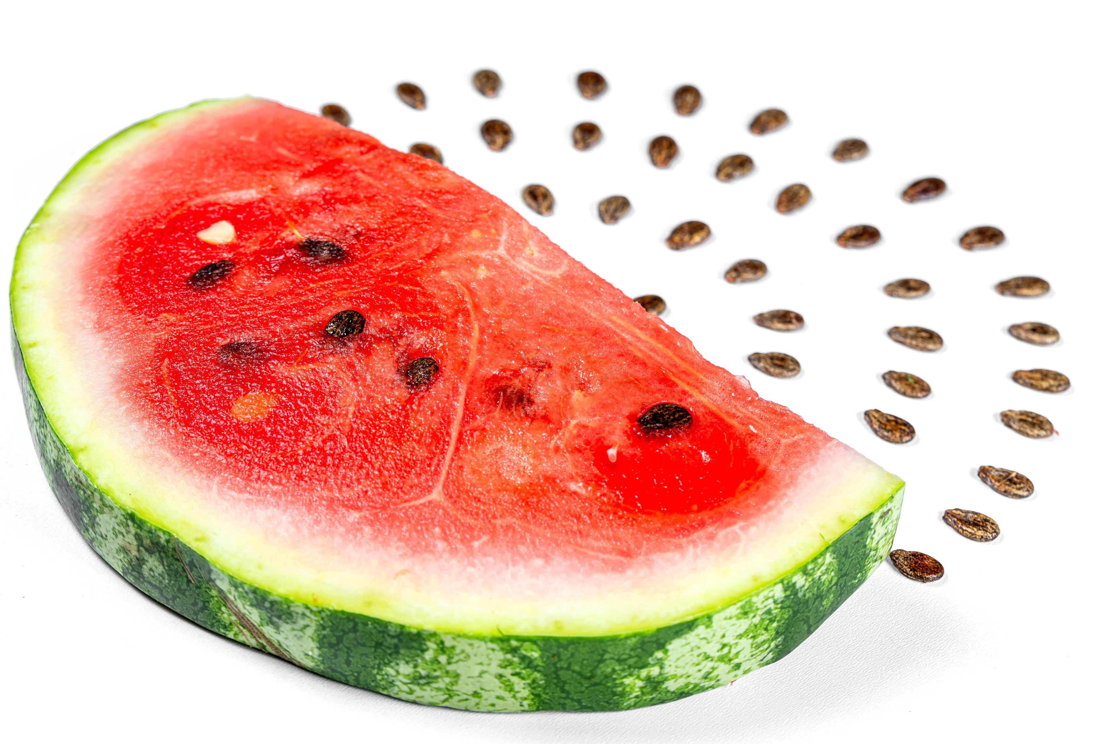Slice of Watermelon with Seeds on White Background HD Wallpaper