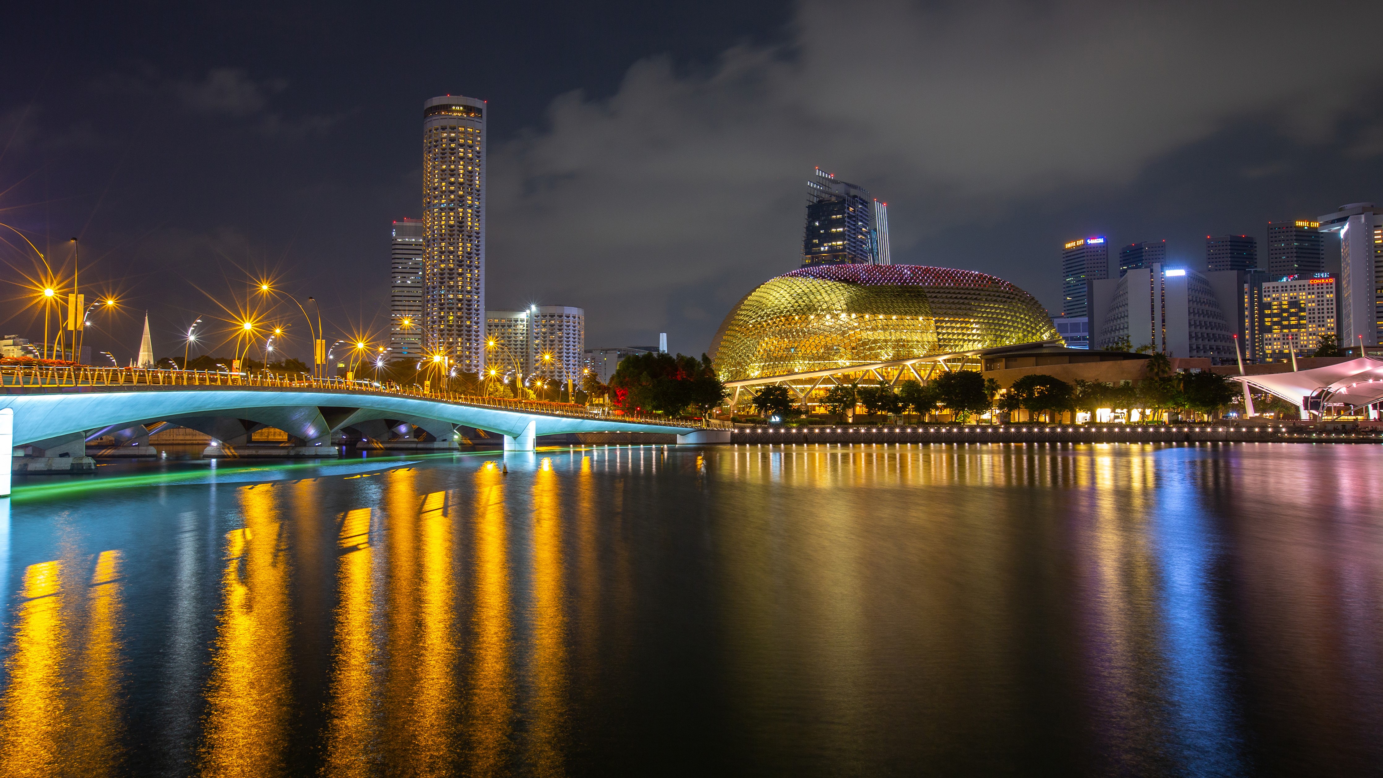 Singapore skyline with bridge and river at night HD Wallpaper