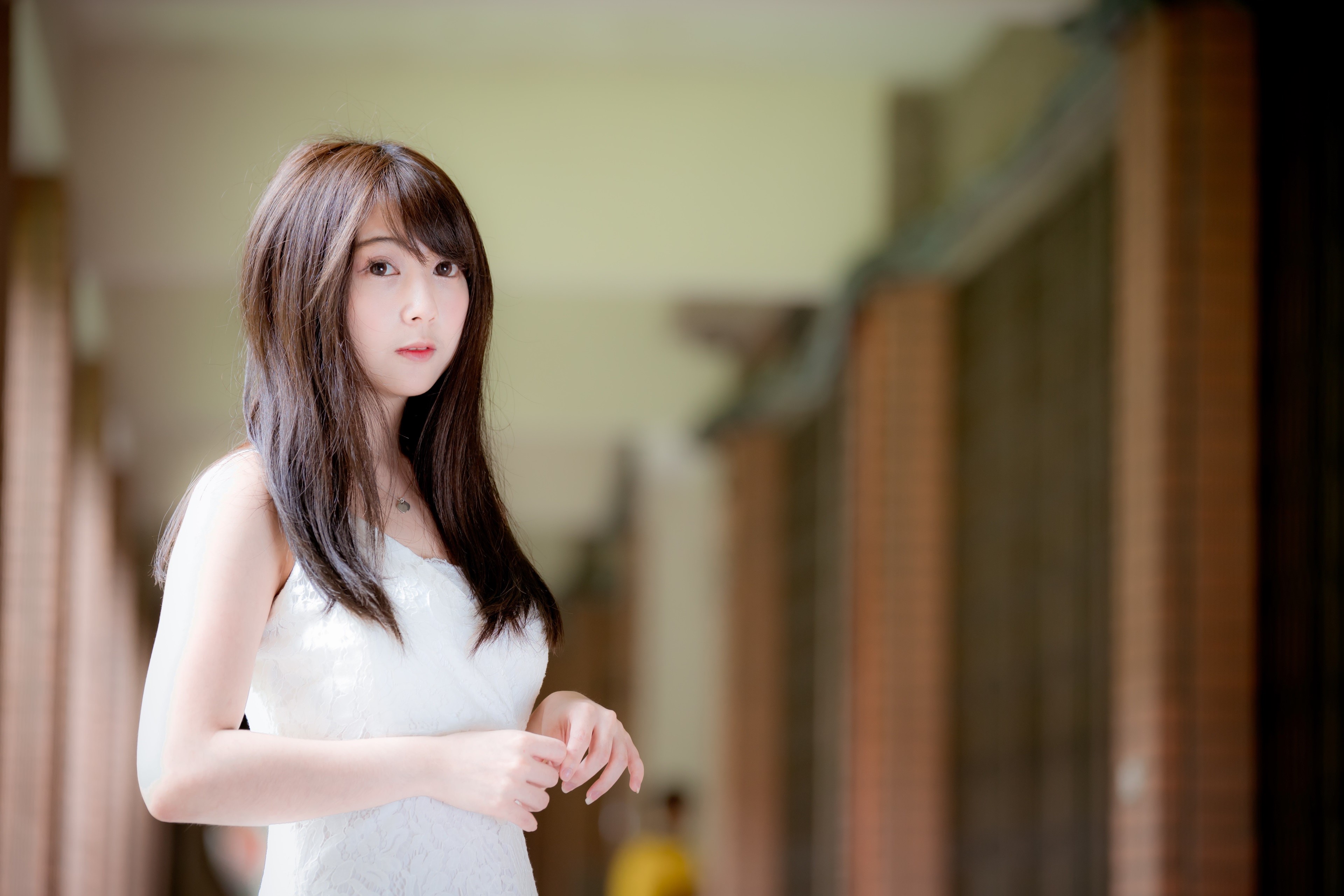 Asian woman with brown hair in a white dress HD Wallpaper