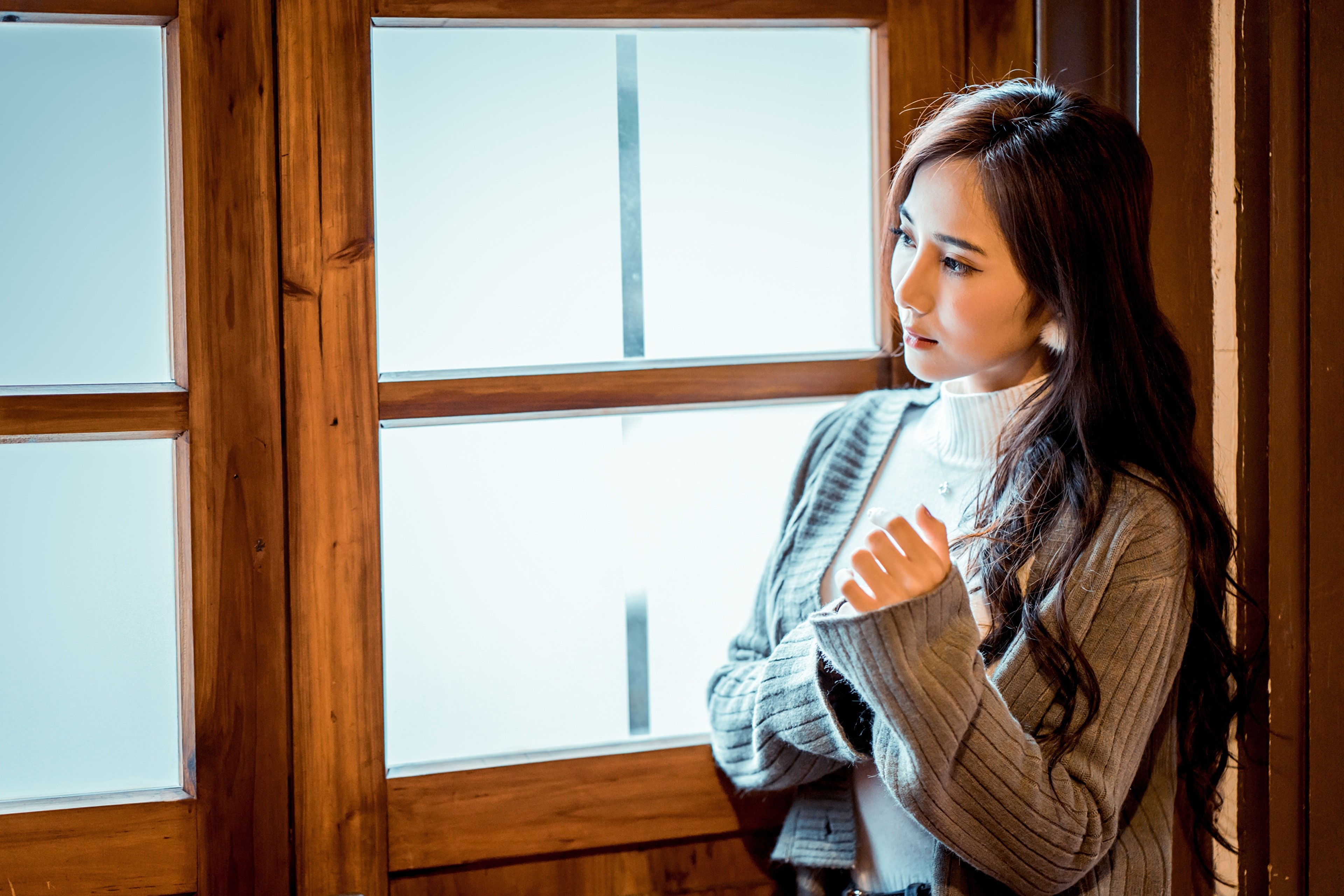 Asian woman with brown hair wearing a sweater HD Wallpaper