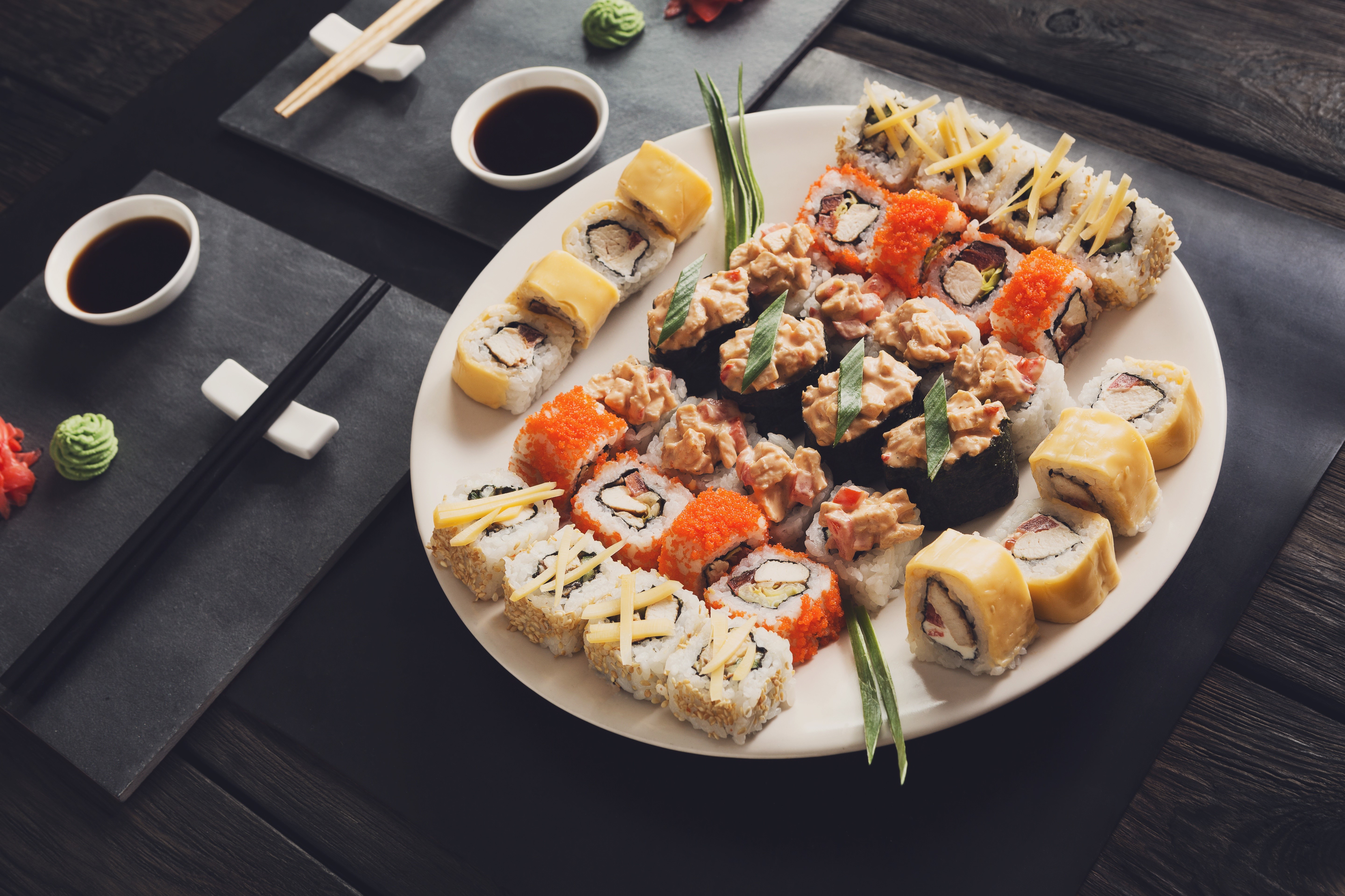 Sushi plate with chopsticks and soy sauce HD Wallpaper
