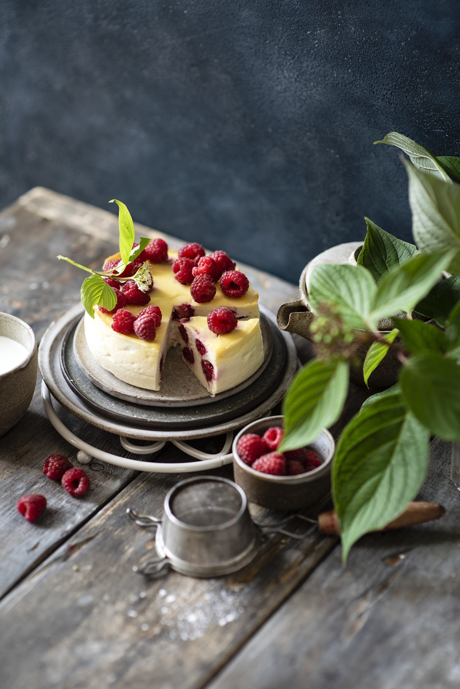 Raspberry cheesecake on a wooden table HD Phone Wallpaper