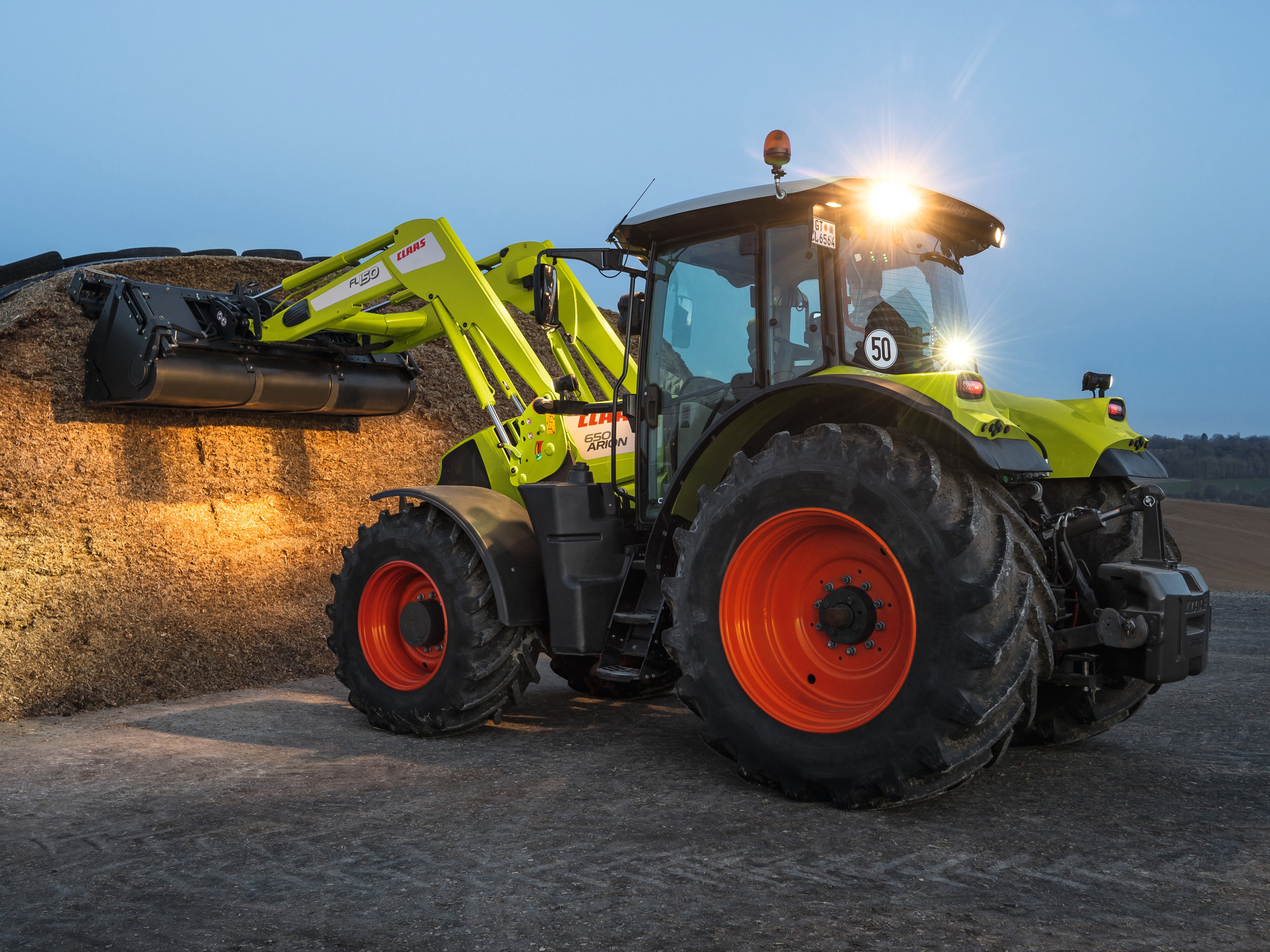 Claas Arion 650 tractor with loader HD Wallpaper