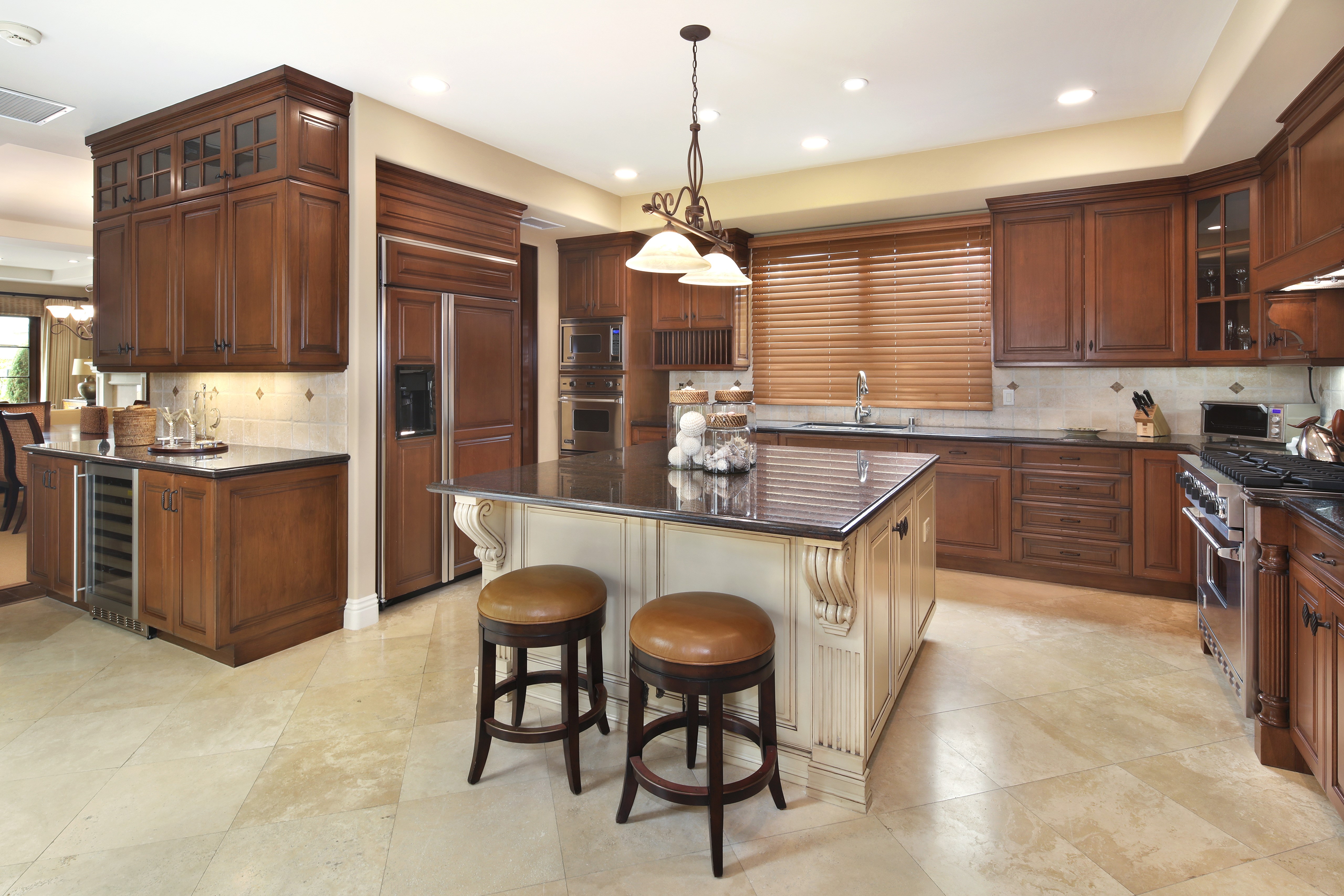 Kitchen with Island and Wooden Cabinets HD Wallpaper