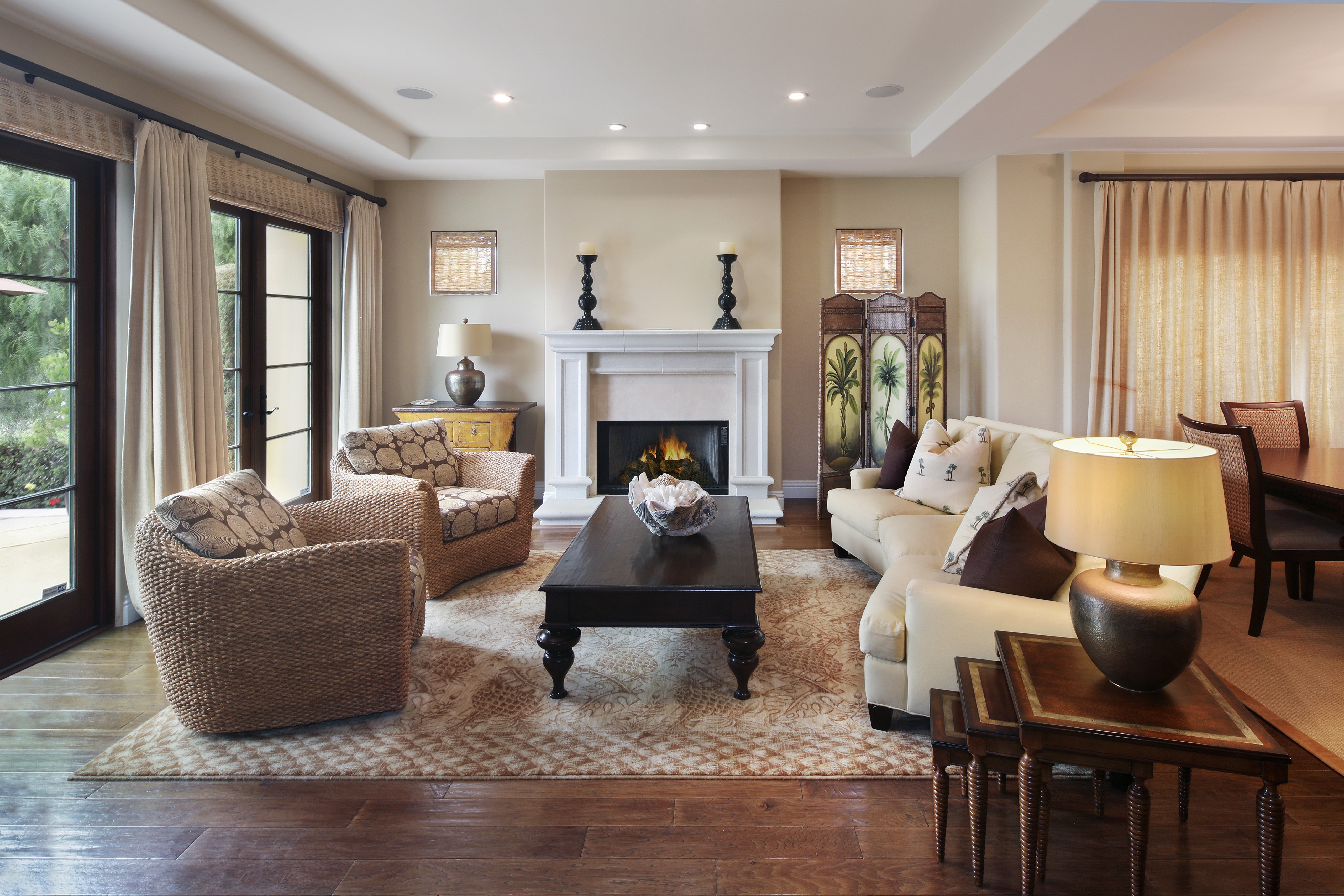 Living room with fireplace and armchairs HD Wallpaper