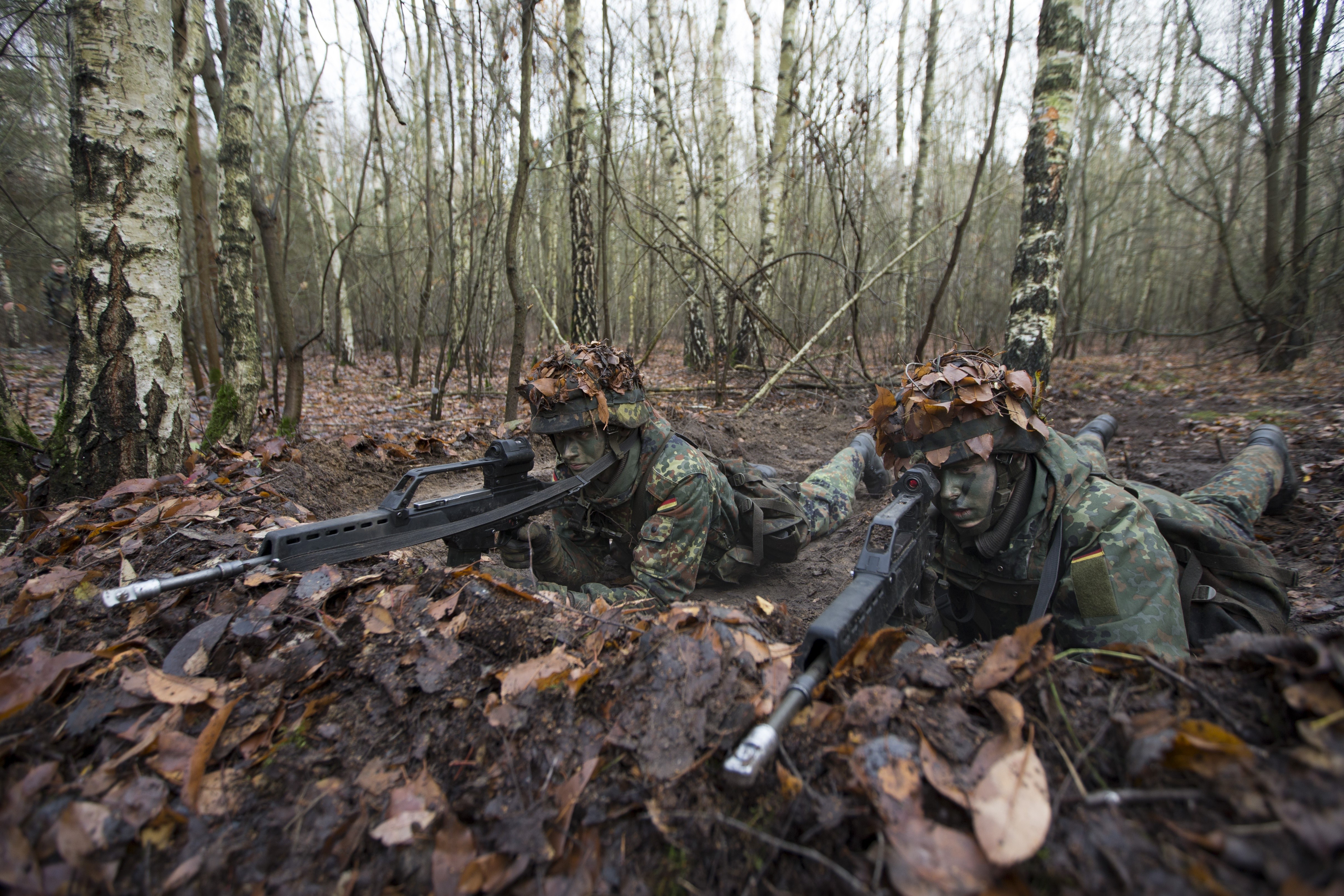 Soldiers with Rifles in Forest Camouflage HD Wallpaper