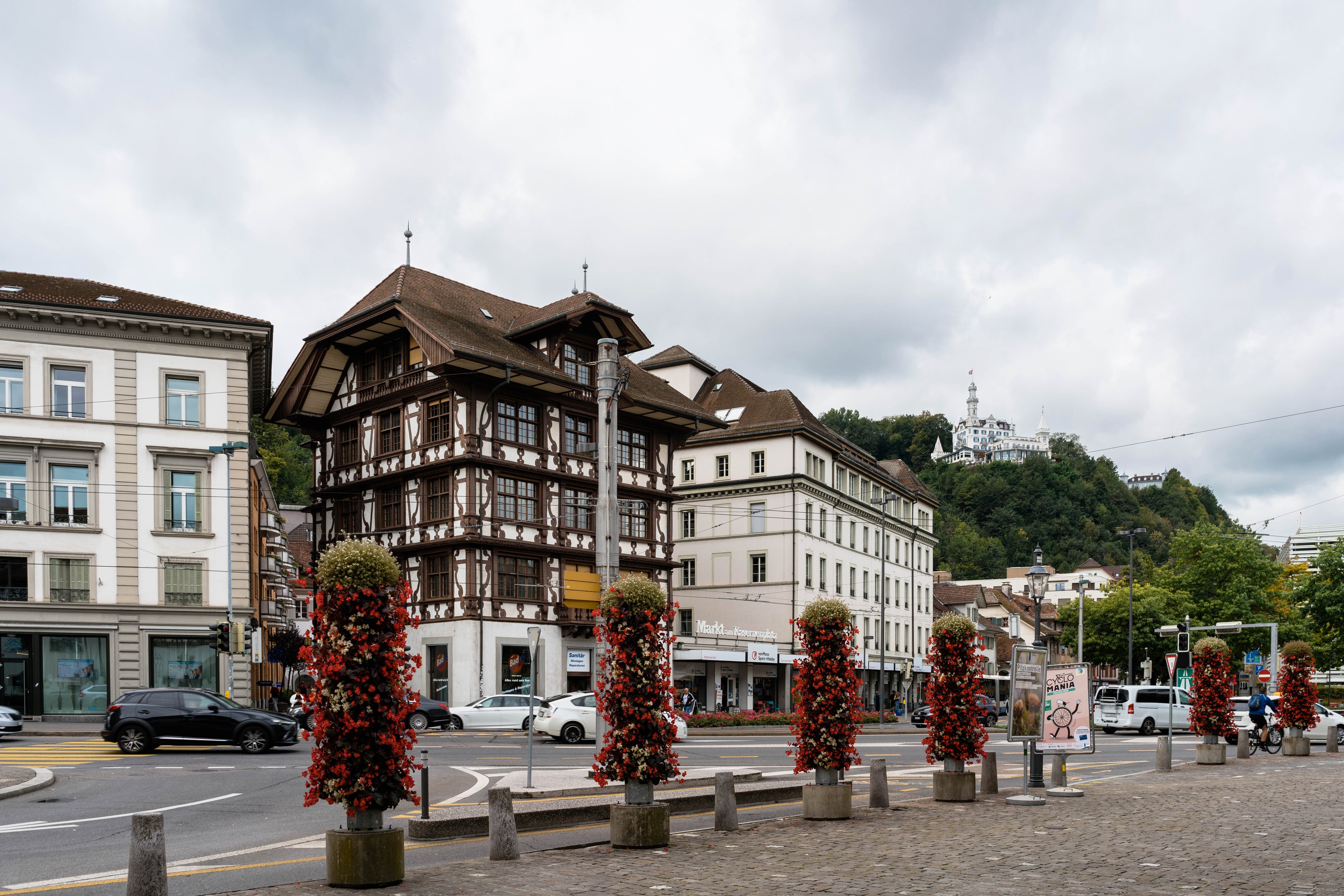 Street view in Lucerne, Switzerland with historic buildings HD Wallpaper