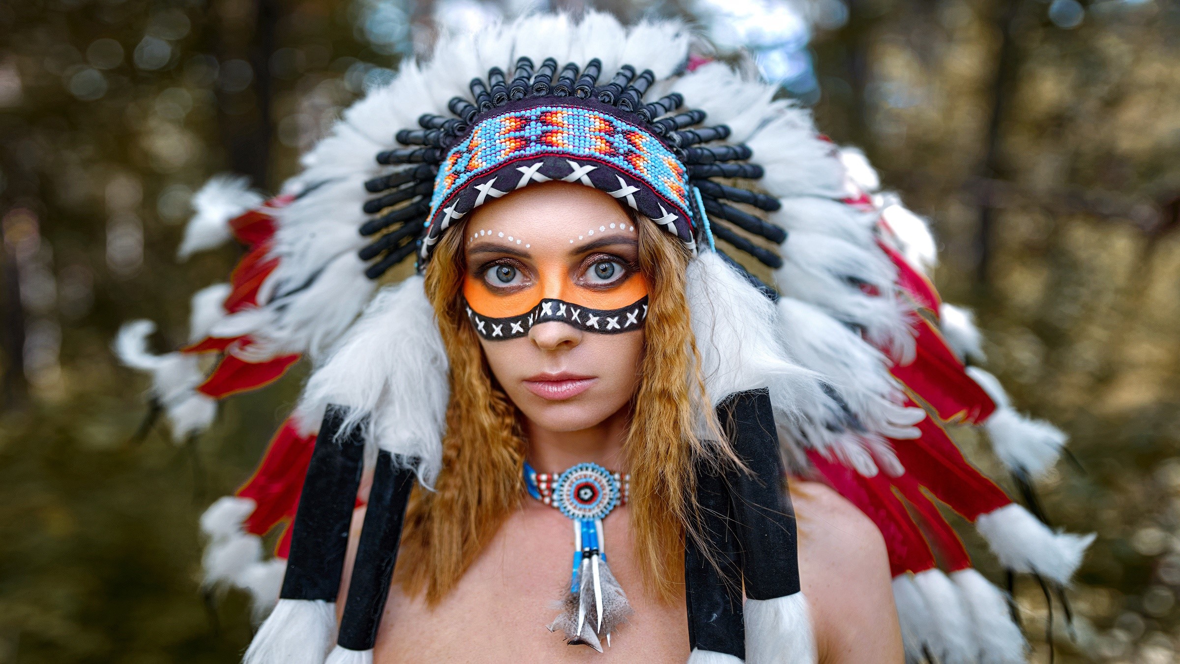 Woman in Native American Headdress with Face Paint HD Wallpaper