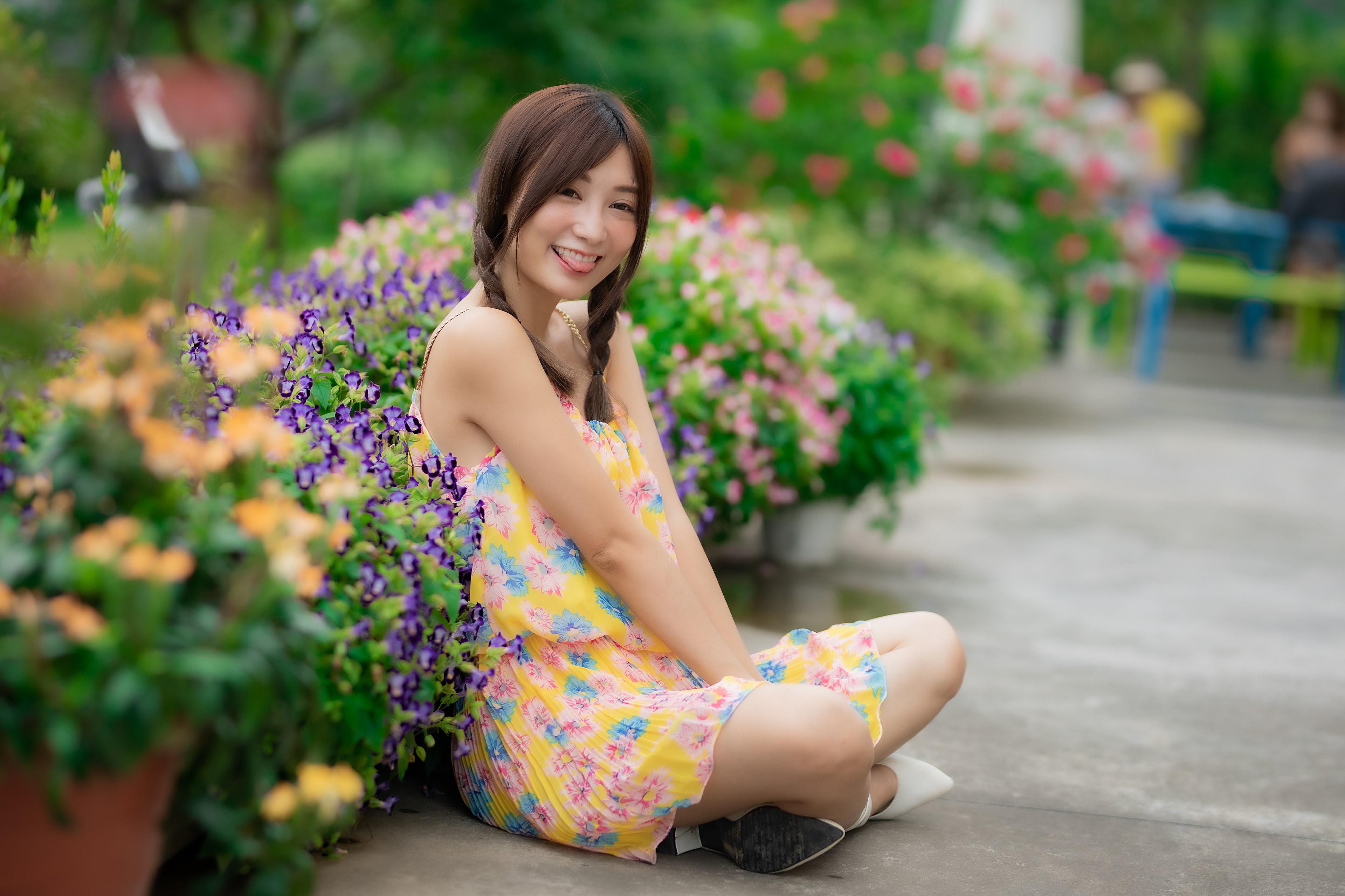 4K Asian Woman Sitting with Braid and Smile HD Wallpaper