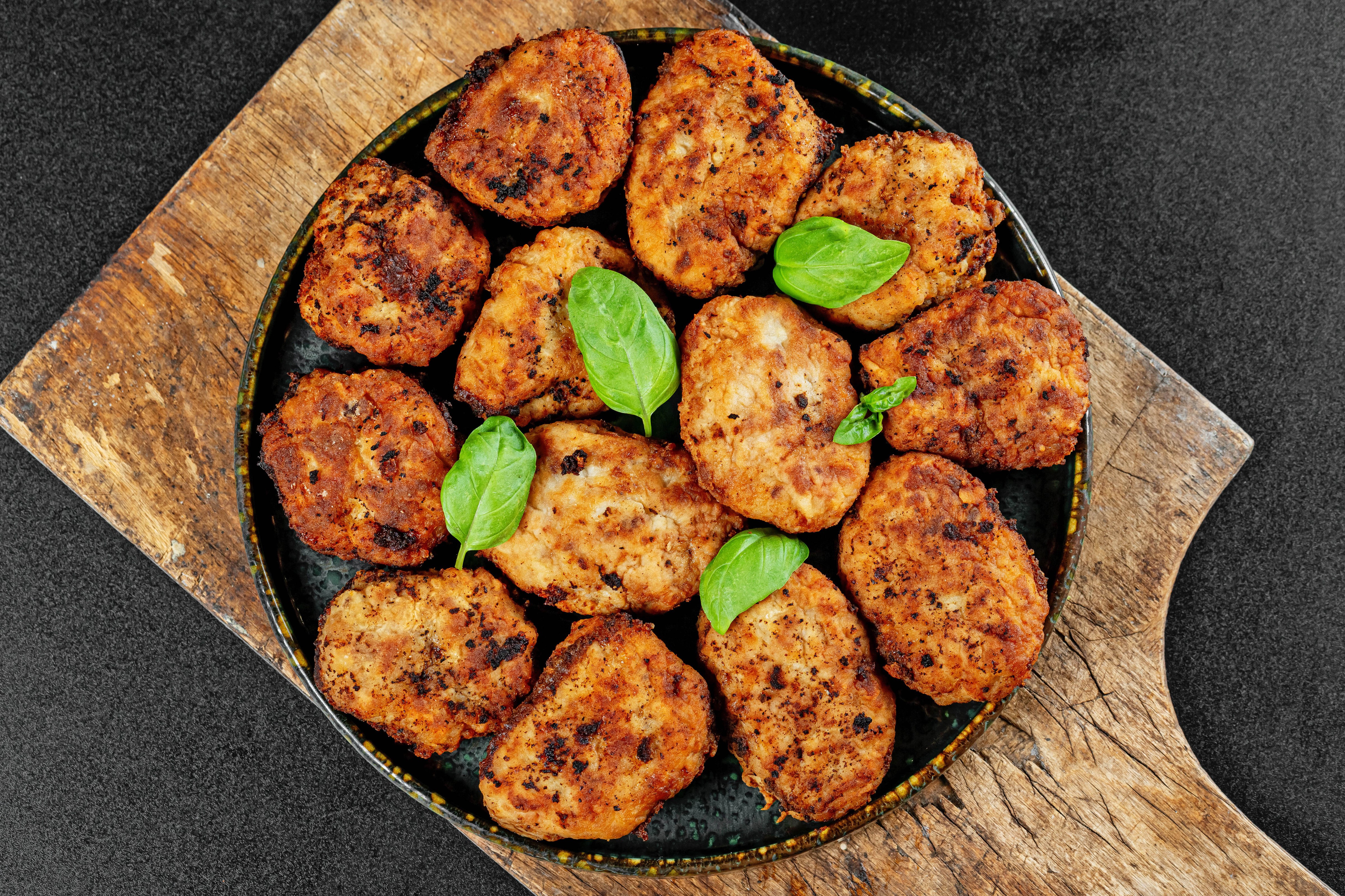 Frikadeller on a cutting board HD Wallpaper