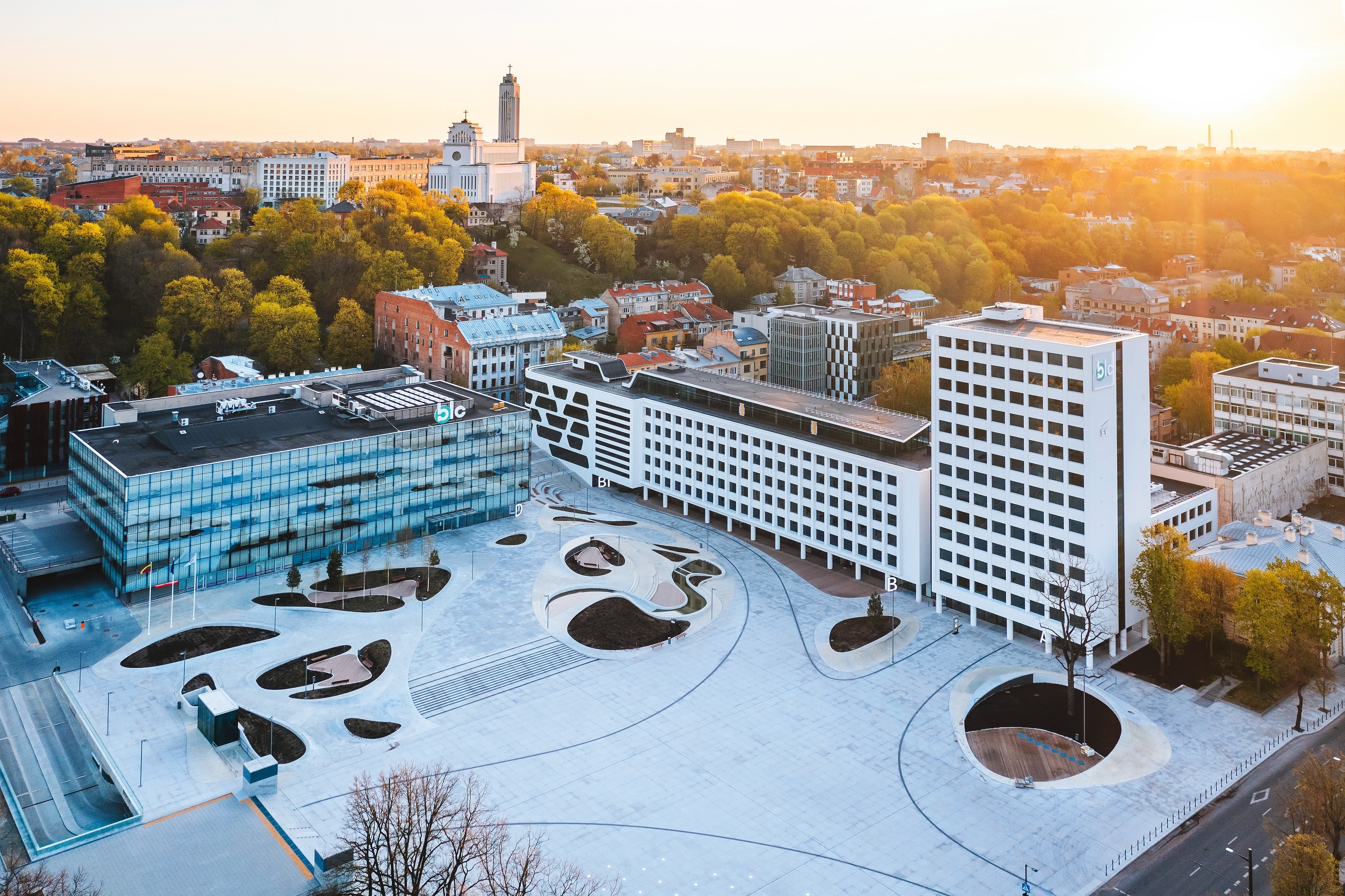 Aerial view of Kaunas, Lithuania with modern buildings and a cathedral HD Wallpaper