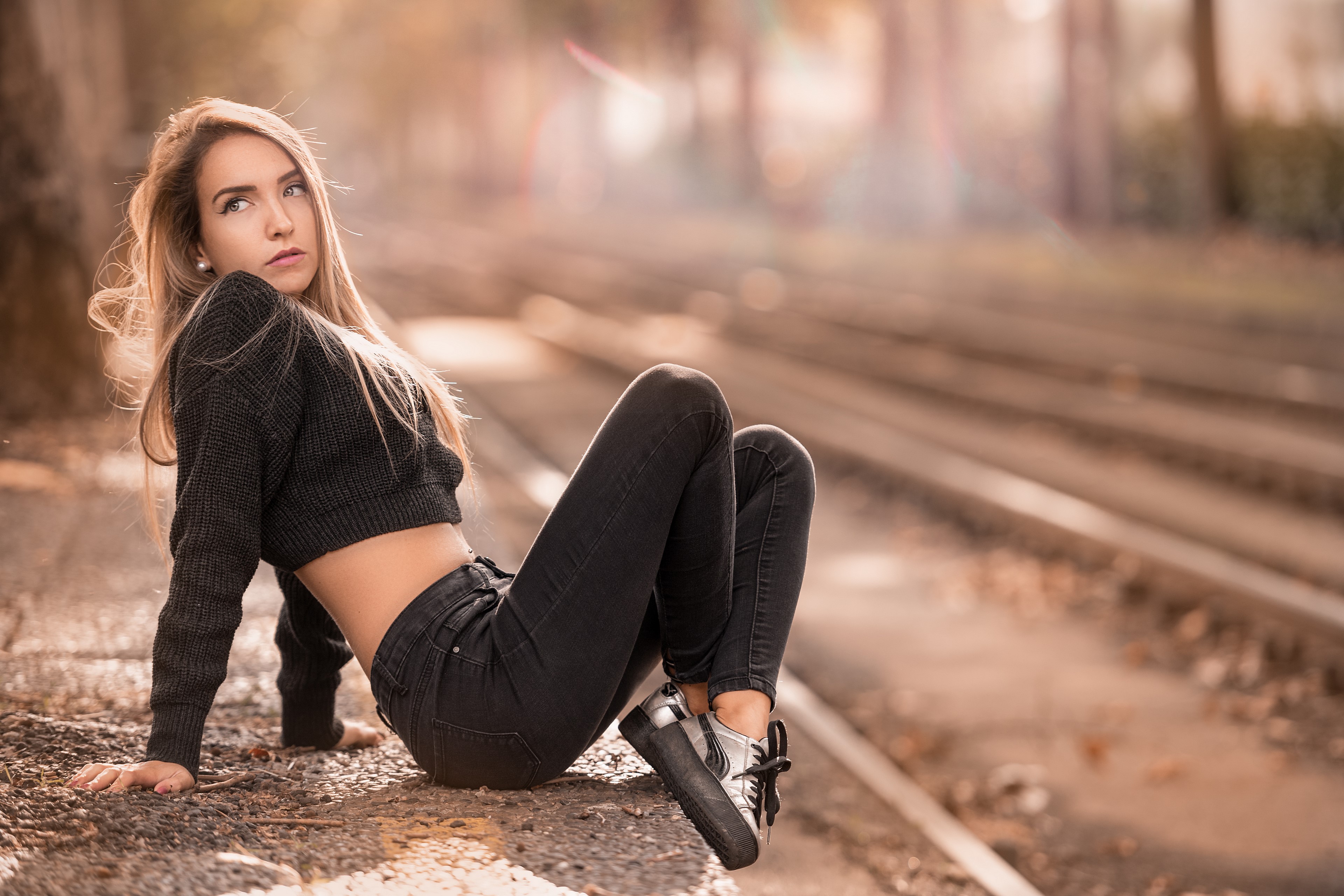 Federica sitting by train tracks HD Wallpaper