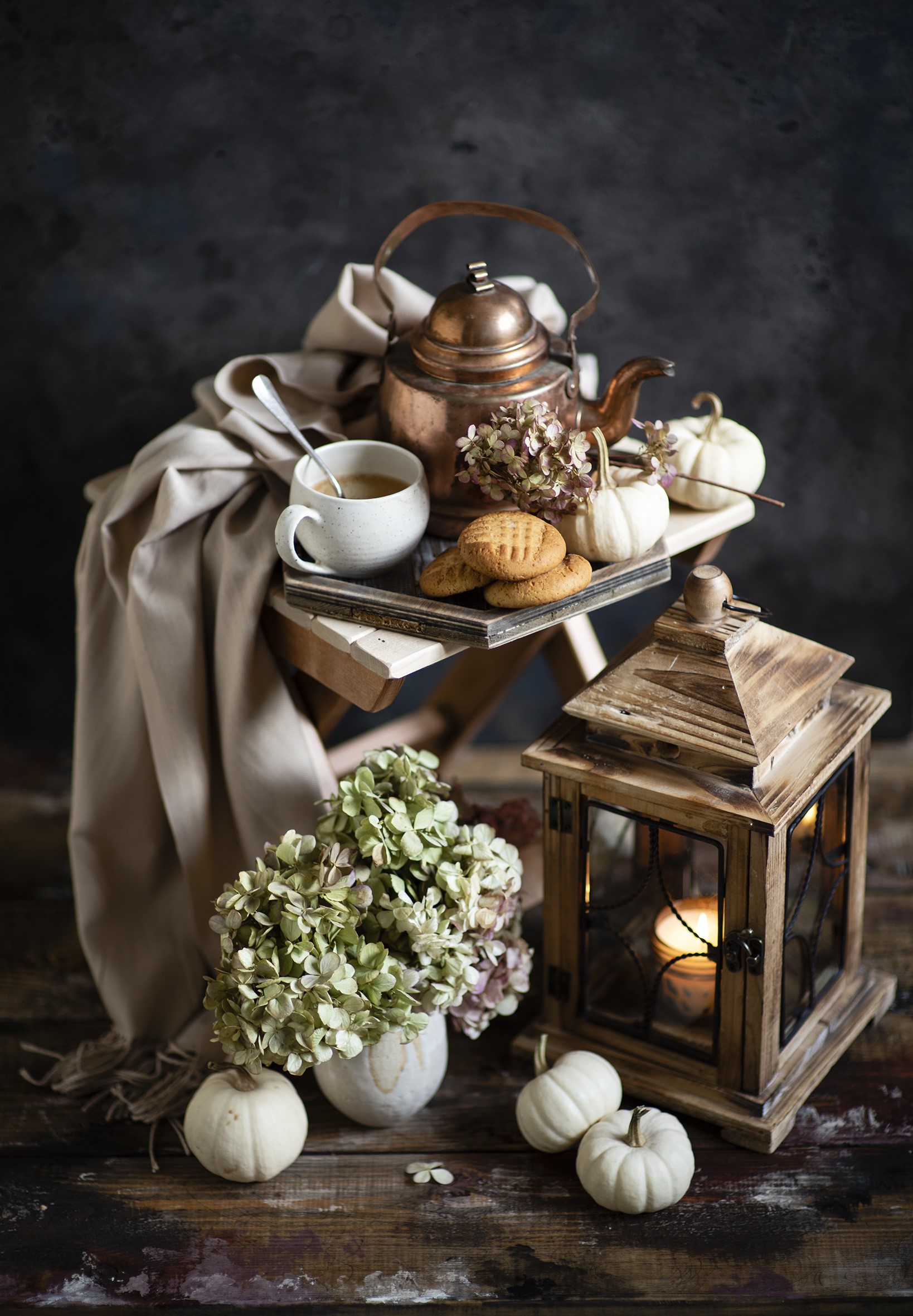 Autumn still life with tea, cookies, pumpkins, and lantern HD Phone Wallpaper