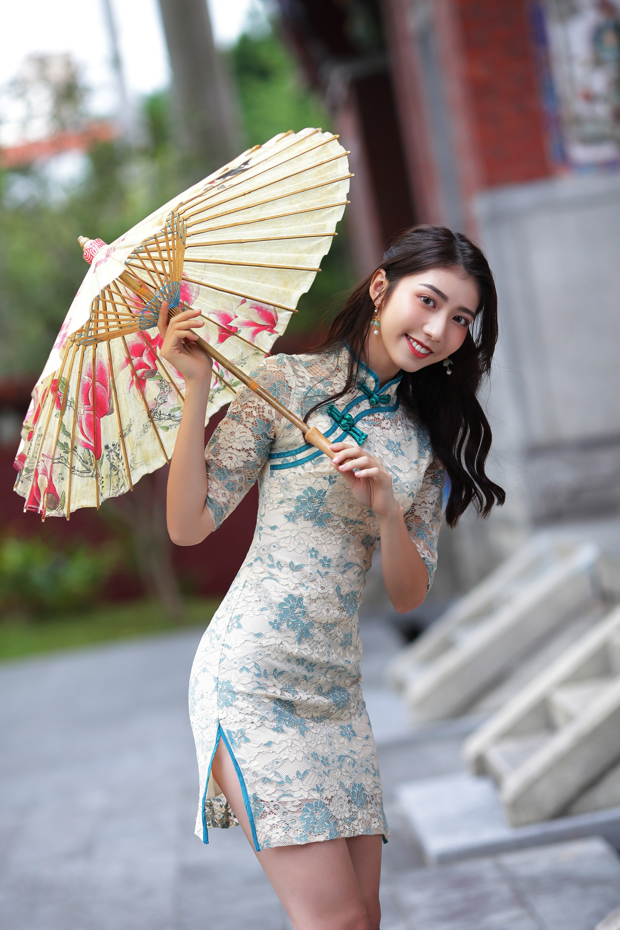 Woman in Cheongsam holding a floral umbrella HD Phone Wallpaper