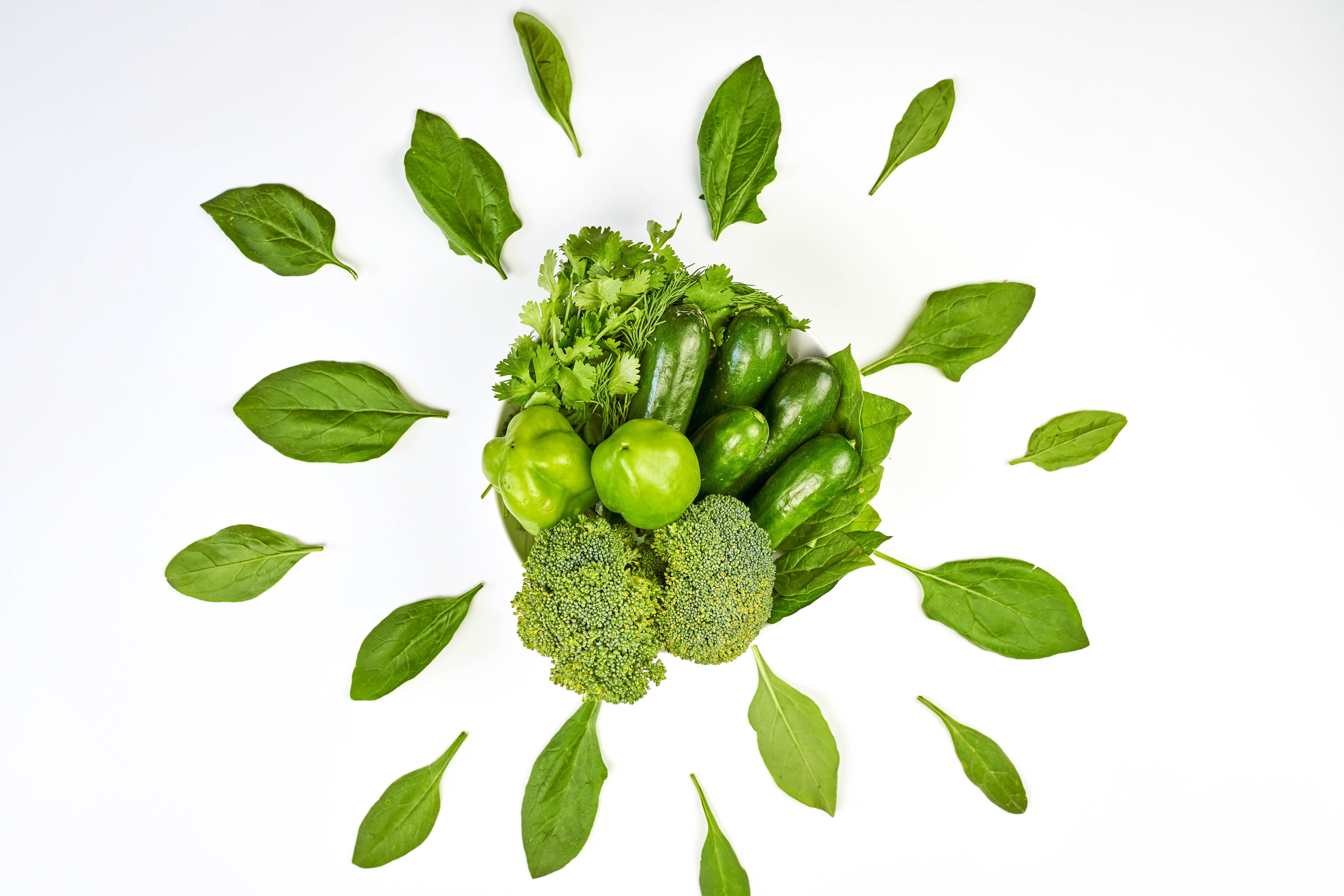 Green vegetables arranged on a white background HD Wallpaper