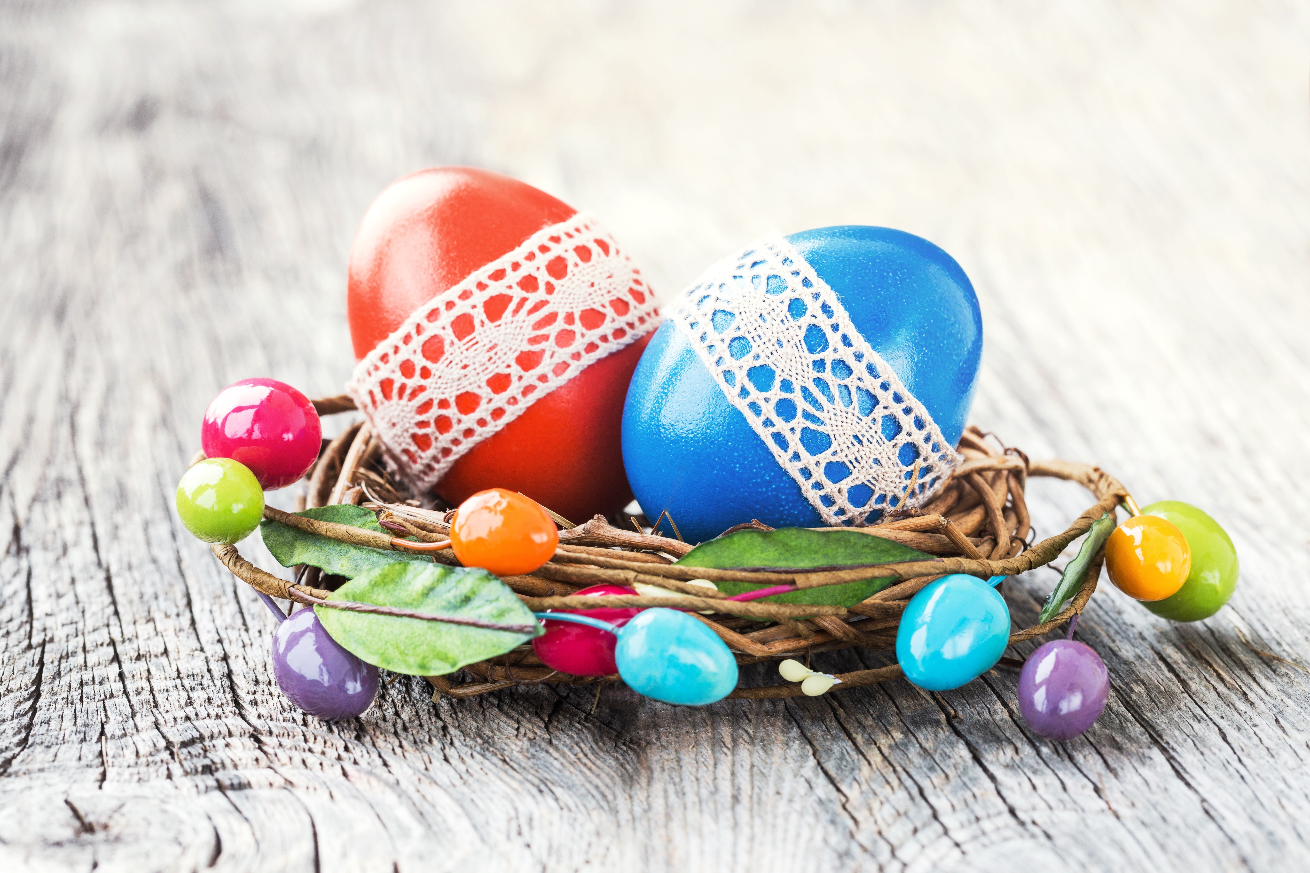 Easter eggs in a nest with decorations HD Wallpaper