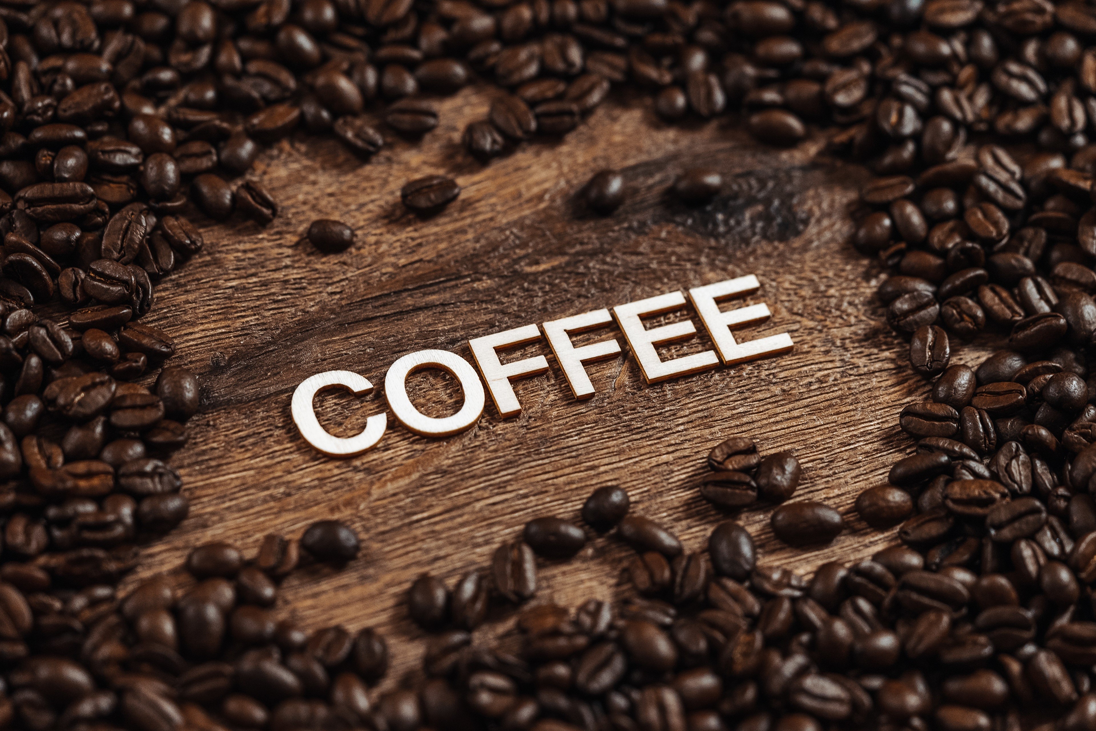 Coffee beans and the word COFFEE on wood HD Wallpaper