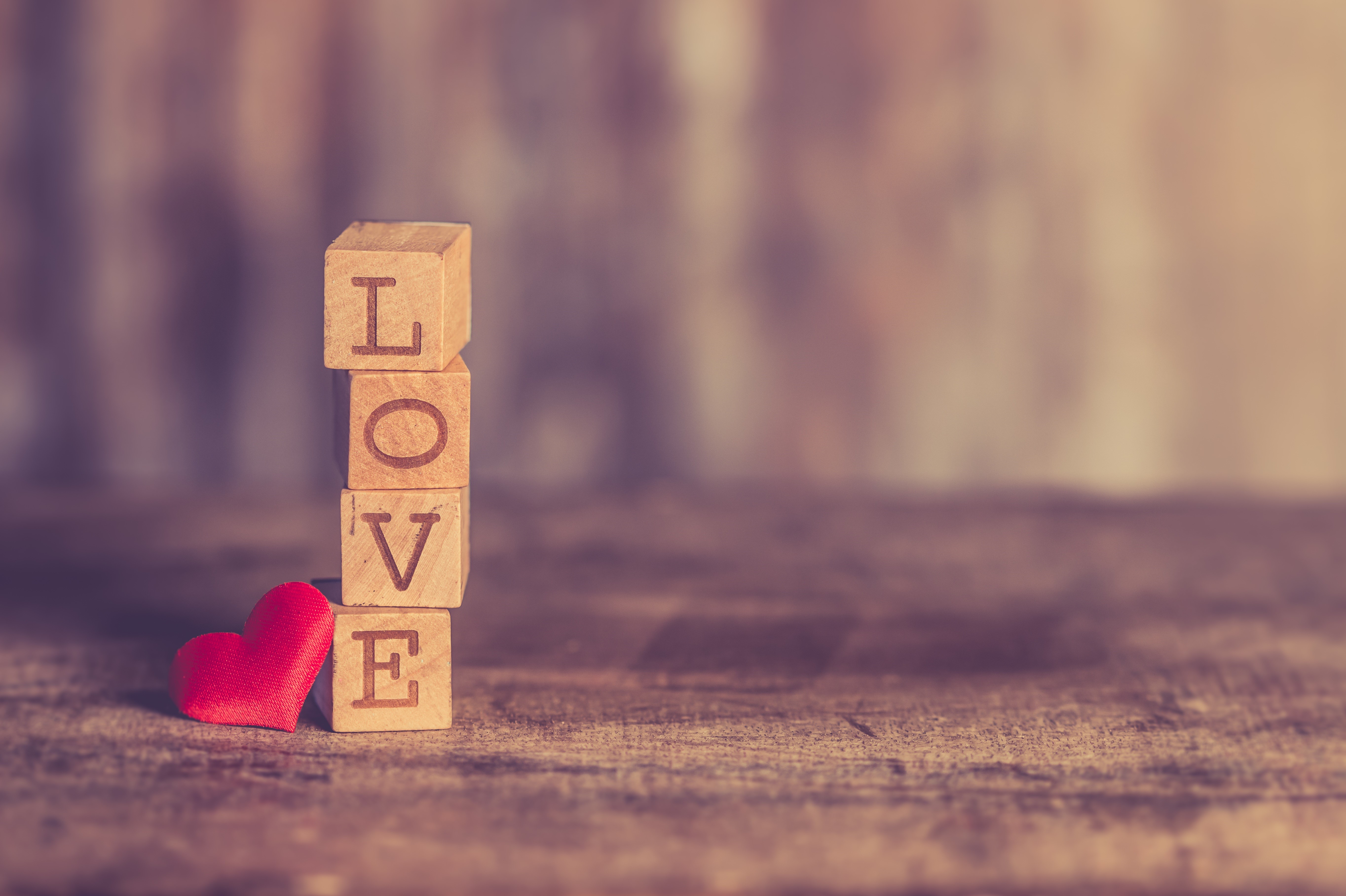 Wooden blocks spelling LOVE with a red heart HD Wallpaper