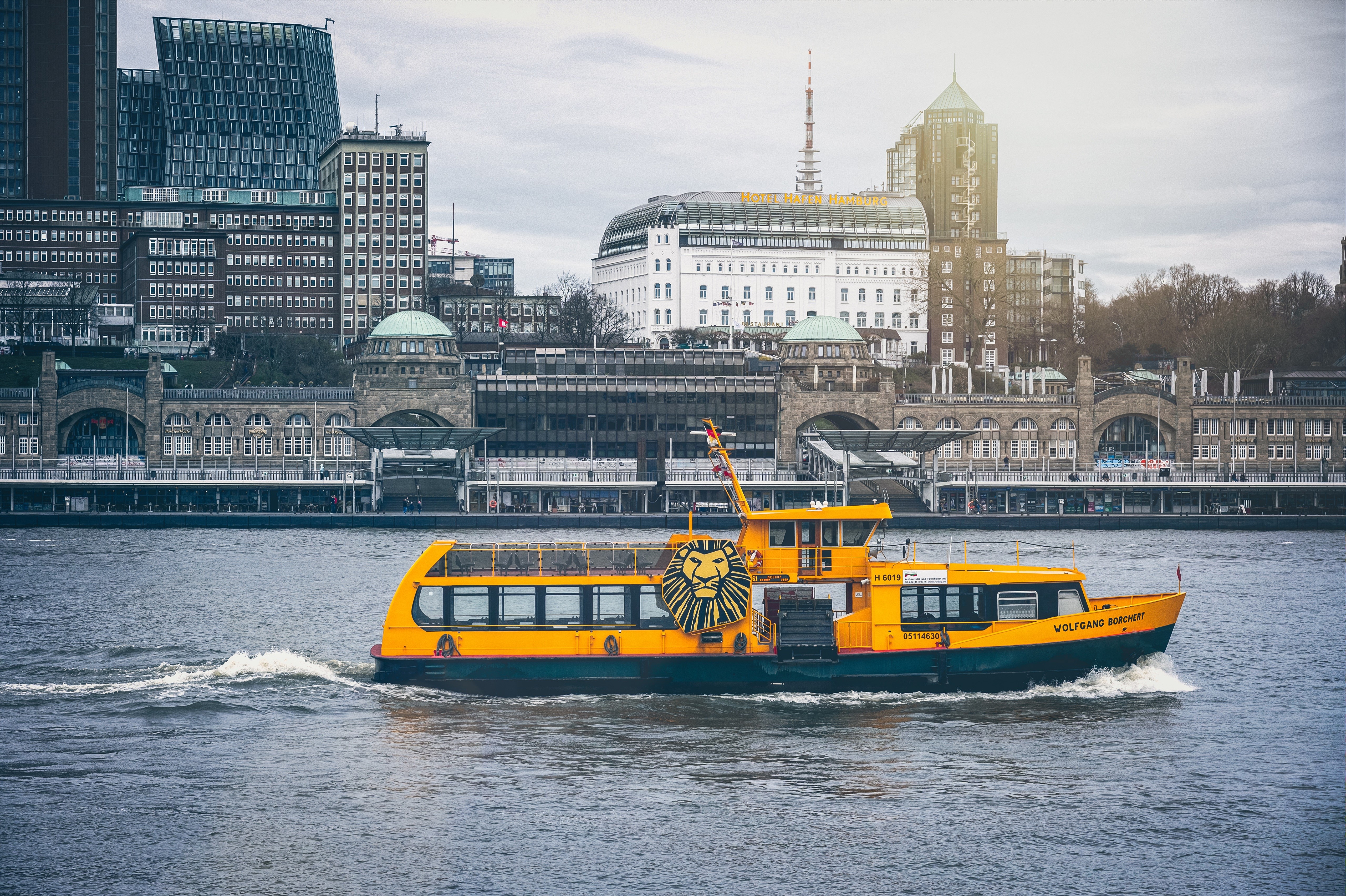 Yellow ferryboat on Elbe River in Hamburg, Germany HD Wallpaper