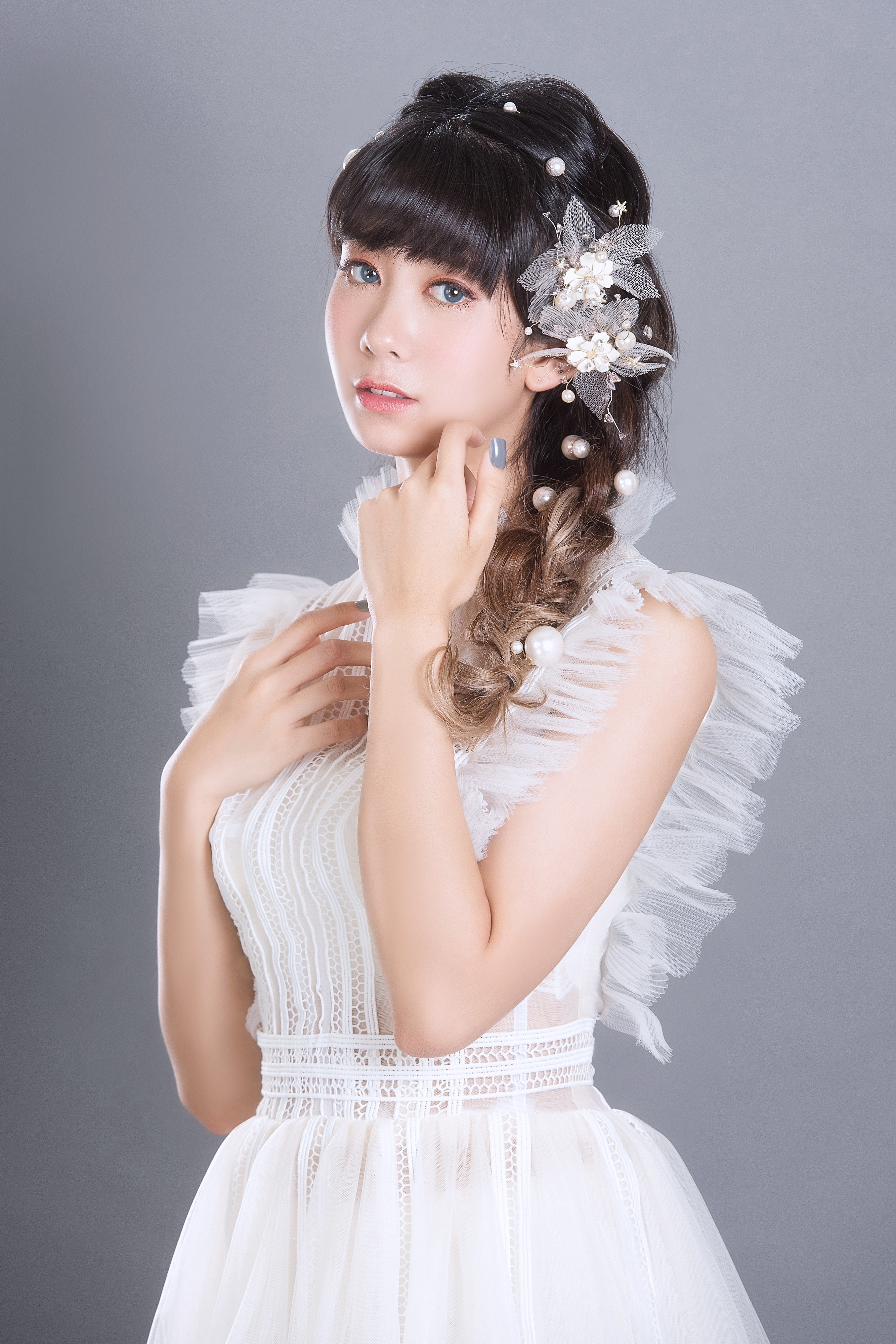 Asian woman with braided hair and pearl accessories in a white dress HD Phone Wallpaper