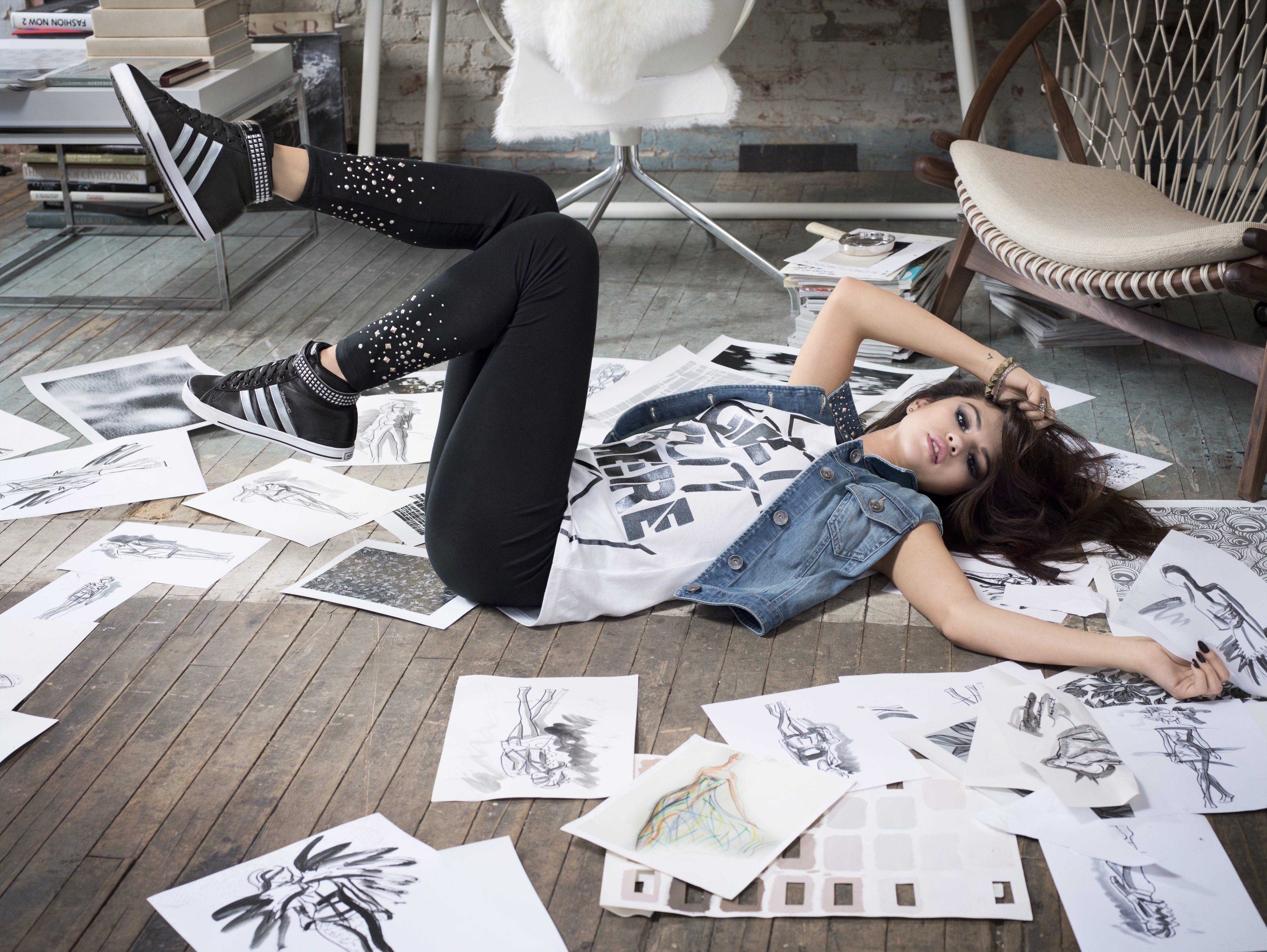 Selena Gomez lying on floor with drawings HD Wallpaper