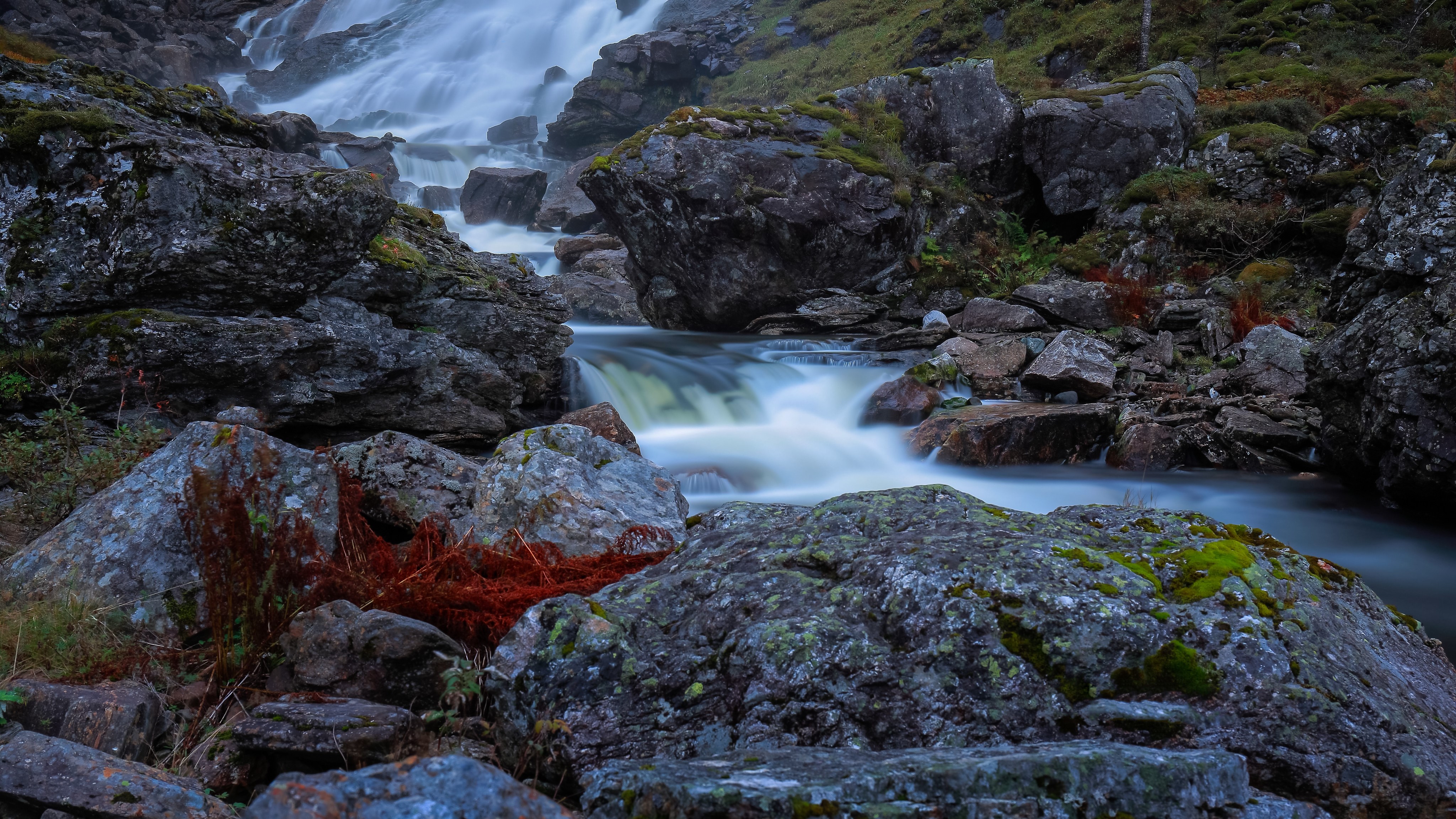 Waterfall and stream in Samnanger, Norway with mossy stones HD Wallpaper