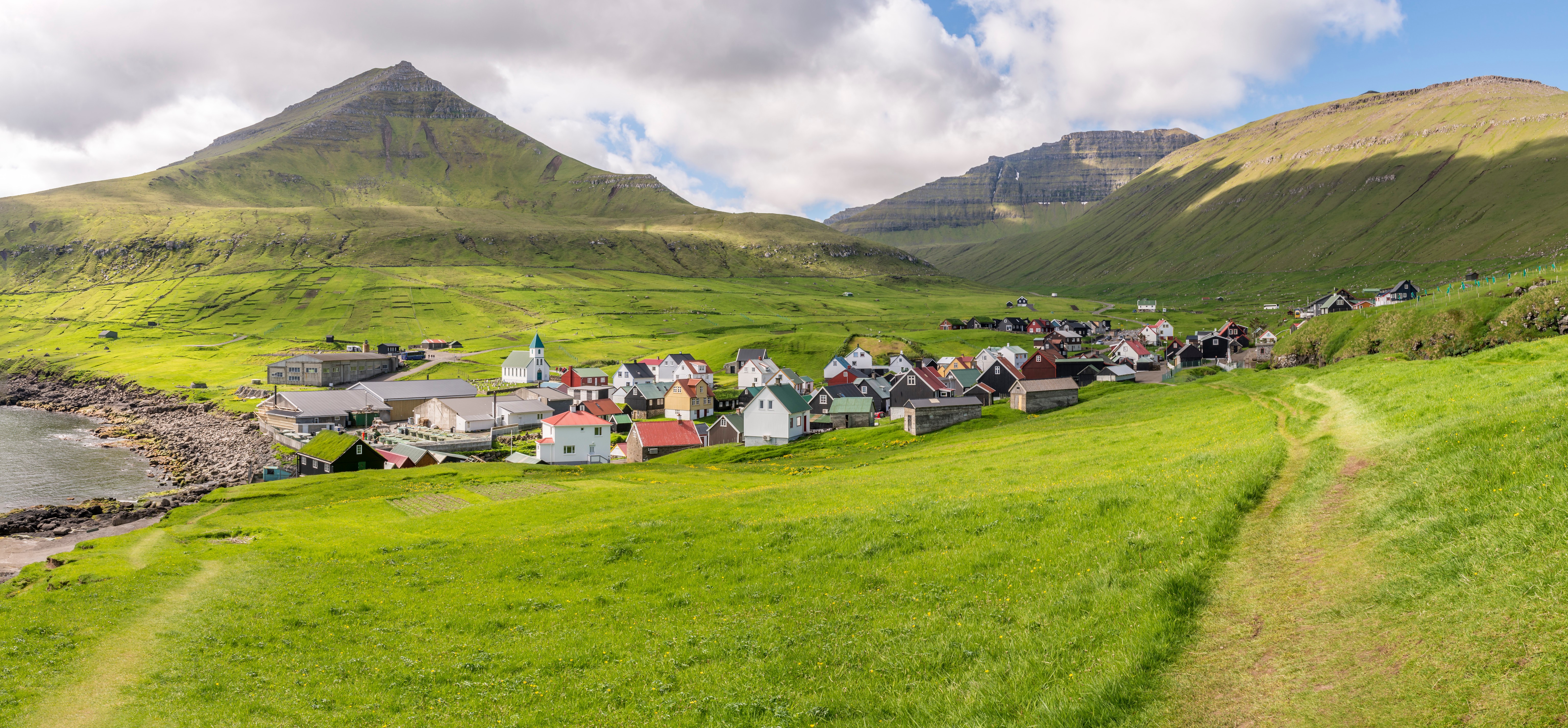 Gjogv, Faroe Islands: Village nestled between green mountains HD Wallpaper