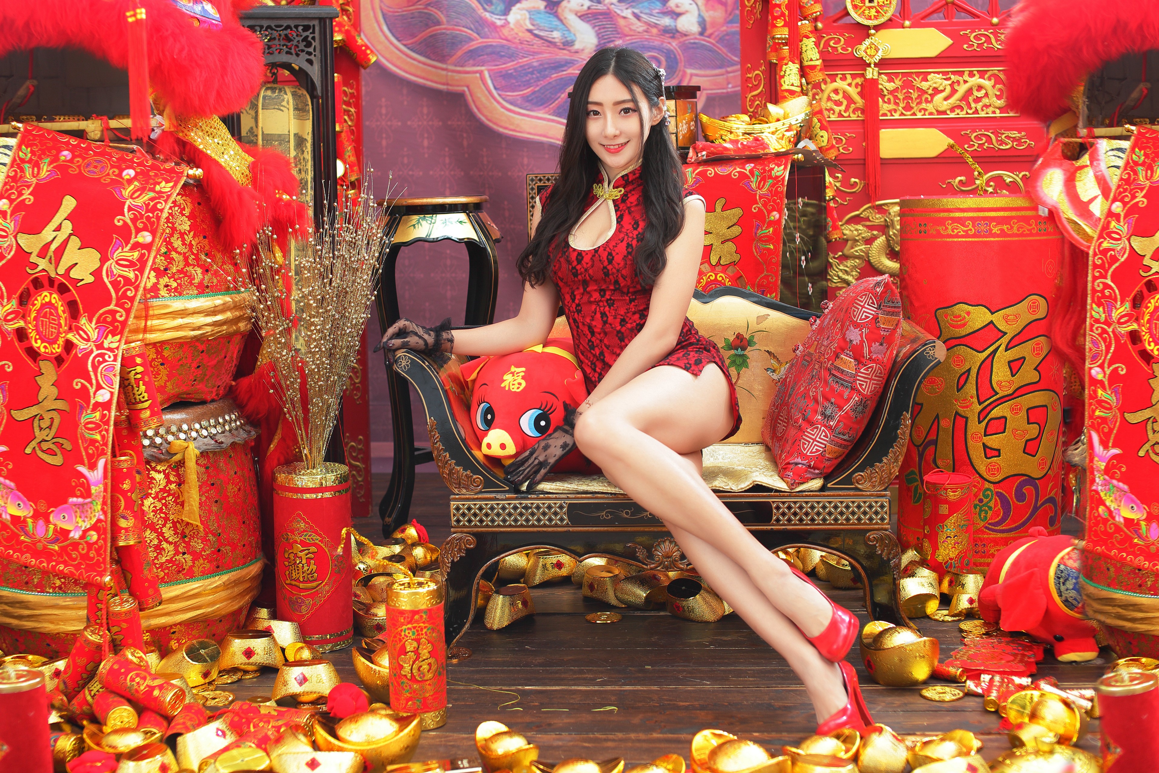 4K Asian Girl in Red Dress Sitting Elegantly HD Wallpaper
