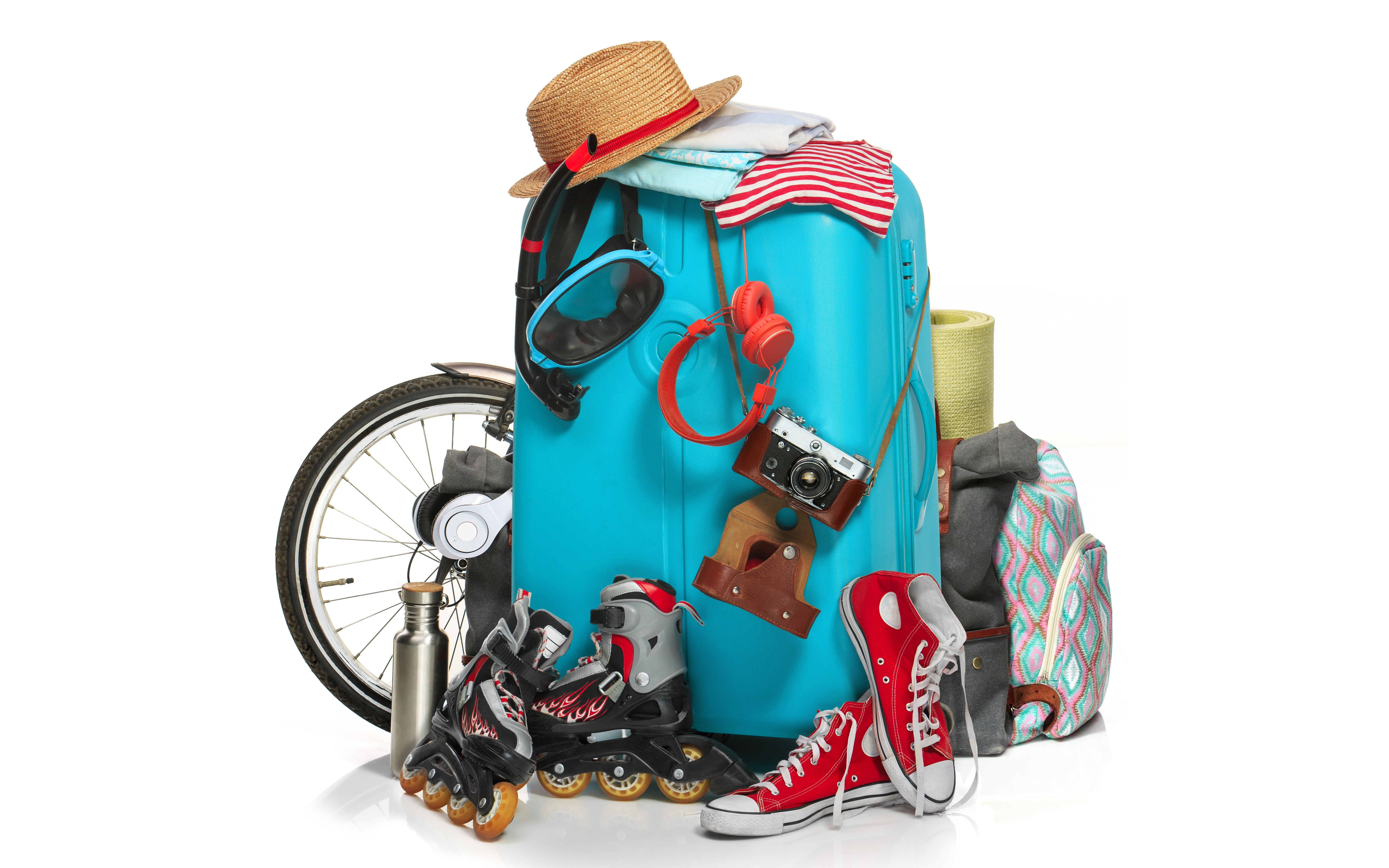 Suitcase with travel items and sports equipment HD Wallpaper