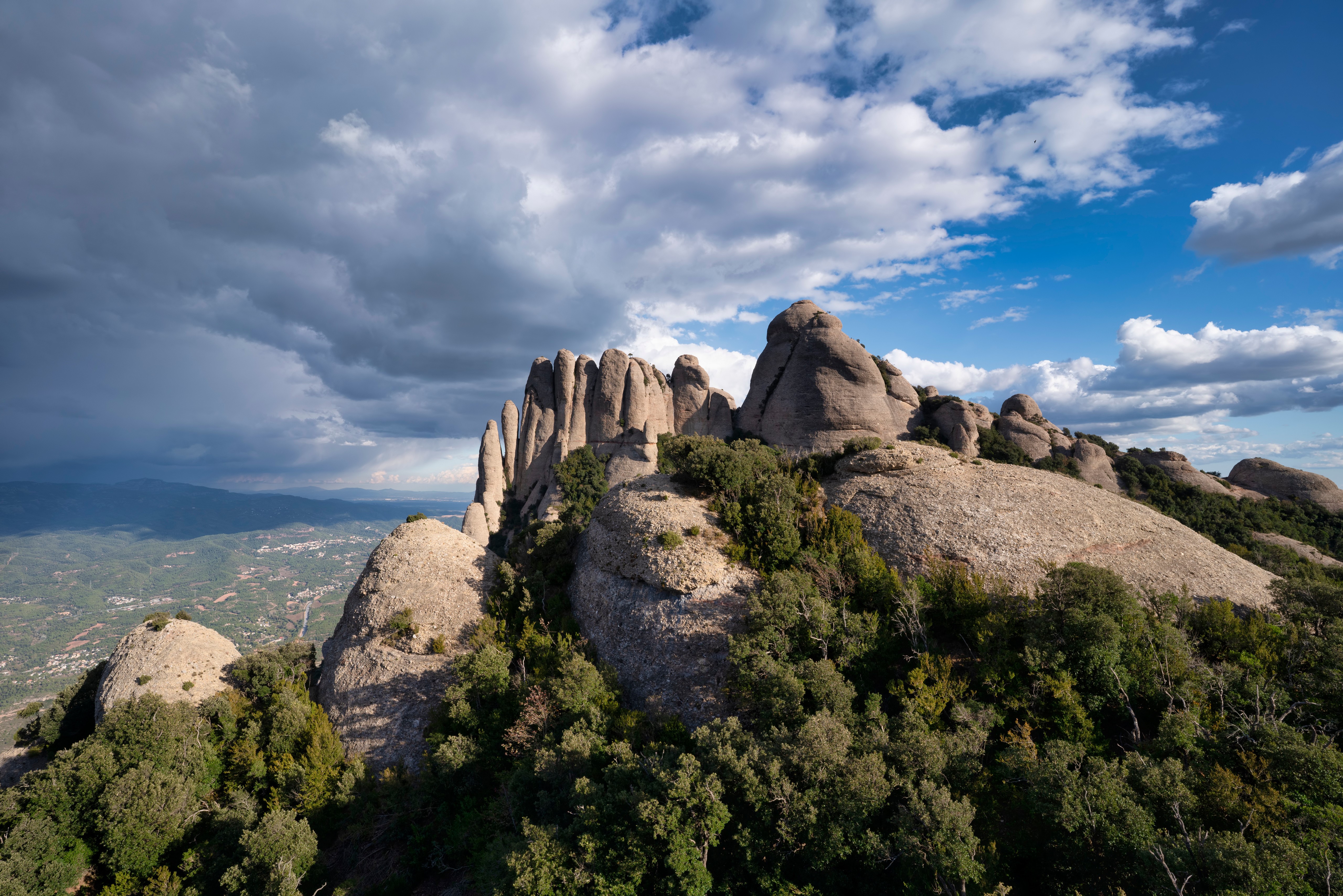 Rocky mountains in Catalonia, Spain under cloudy sky HD Wallpaper