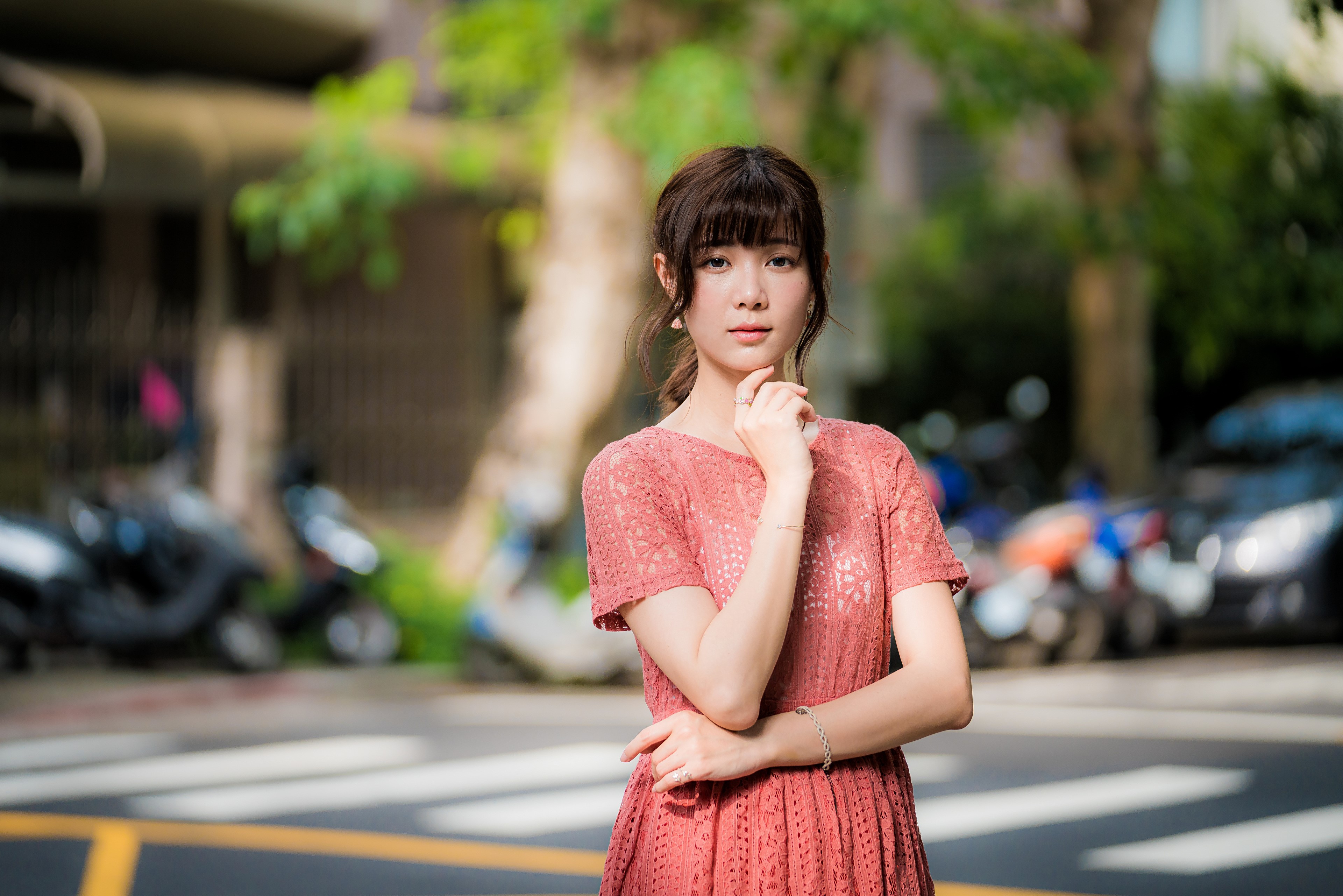 Asian woman in pink dress posing outdoors HD Wallpaper