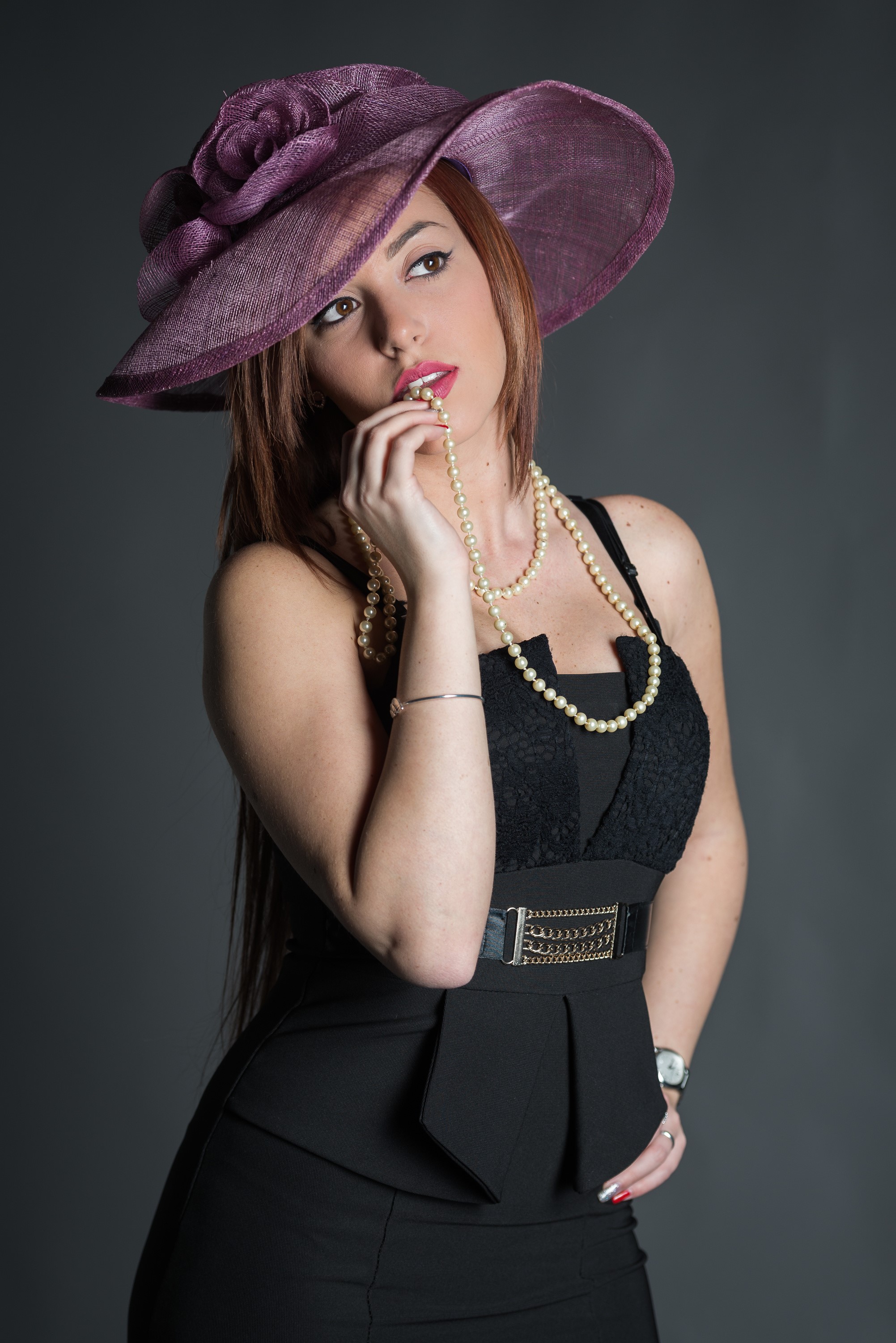 Woman in purple hat and black dress with pearls HD Phone Wallpaper