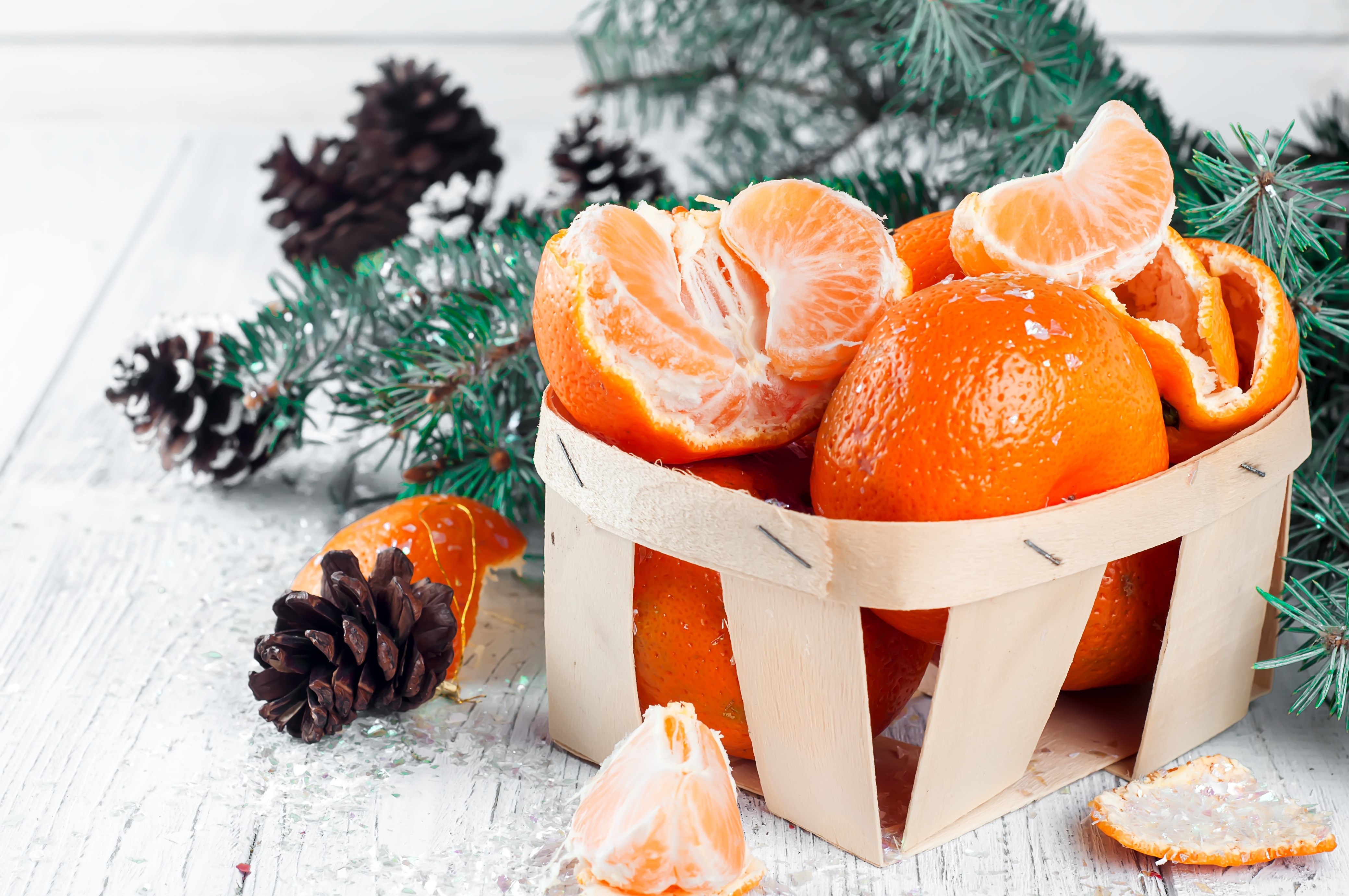 4K Mandarines and Pine Cones with Christmas Tree Branches HD Wallpaper