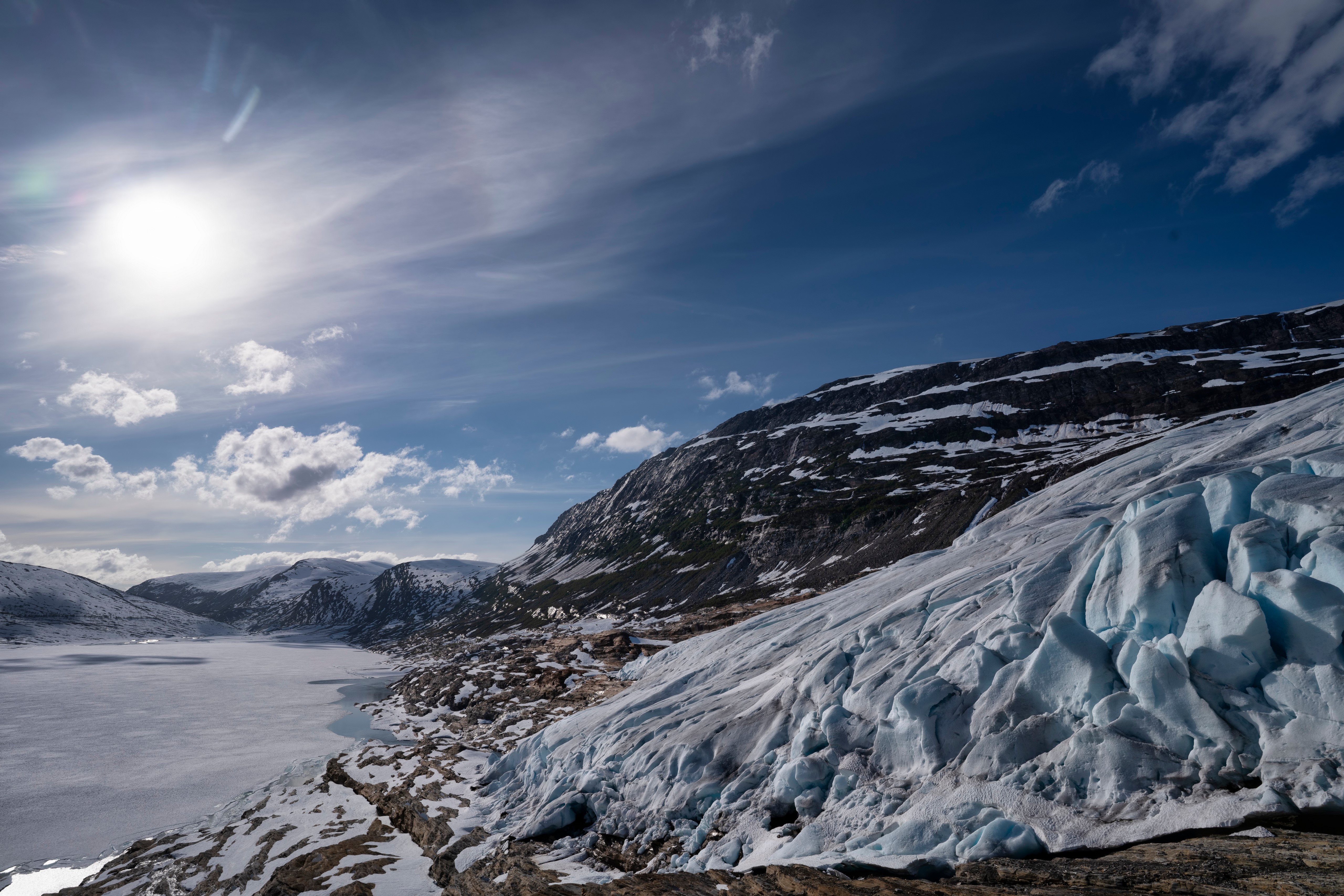 Austerdalsisen Glacier in Norway with Mountains and Sun HD Wallpaper