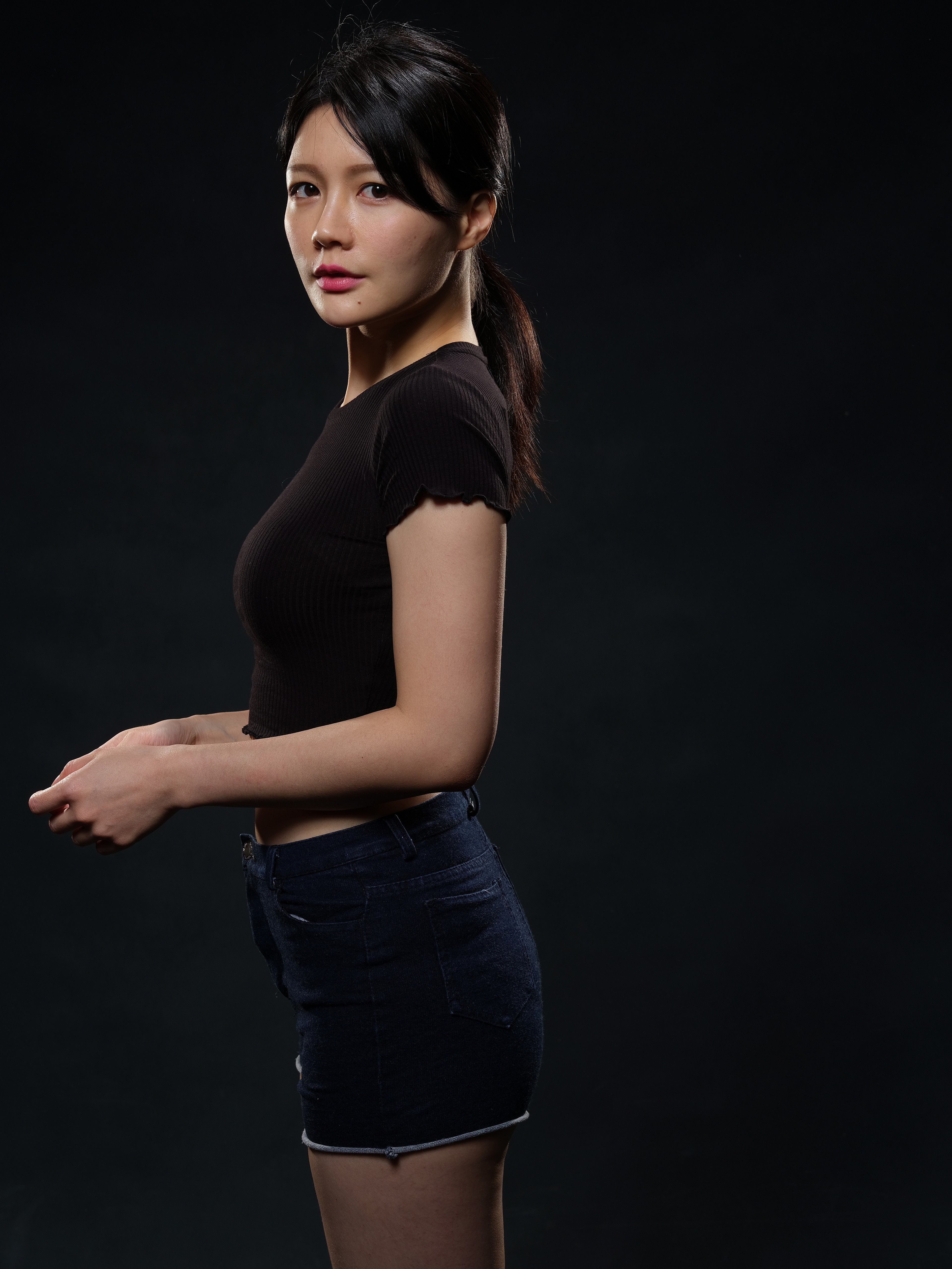 Asian girl in black top and denim shorts HD Phone Wallpaper