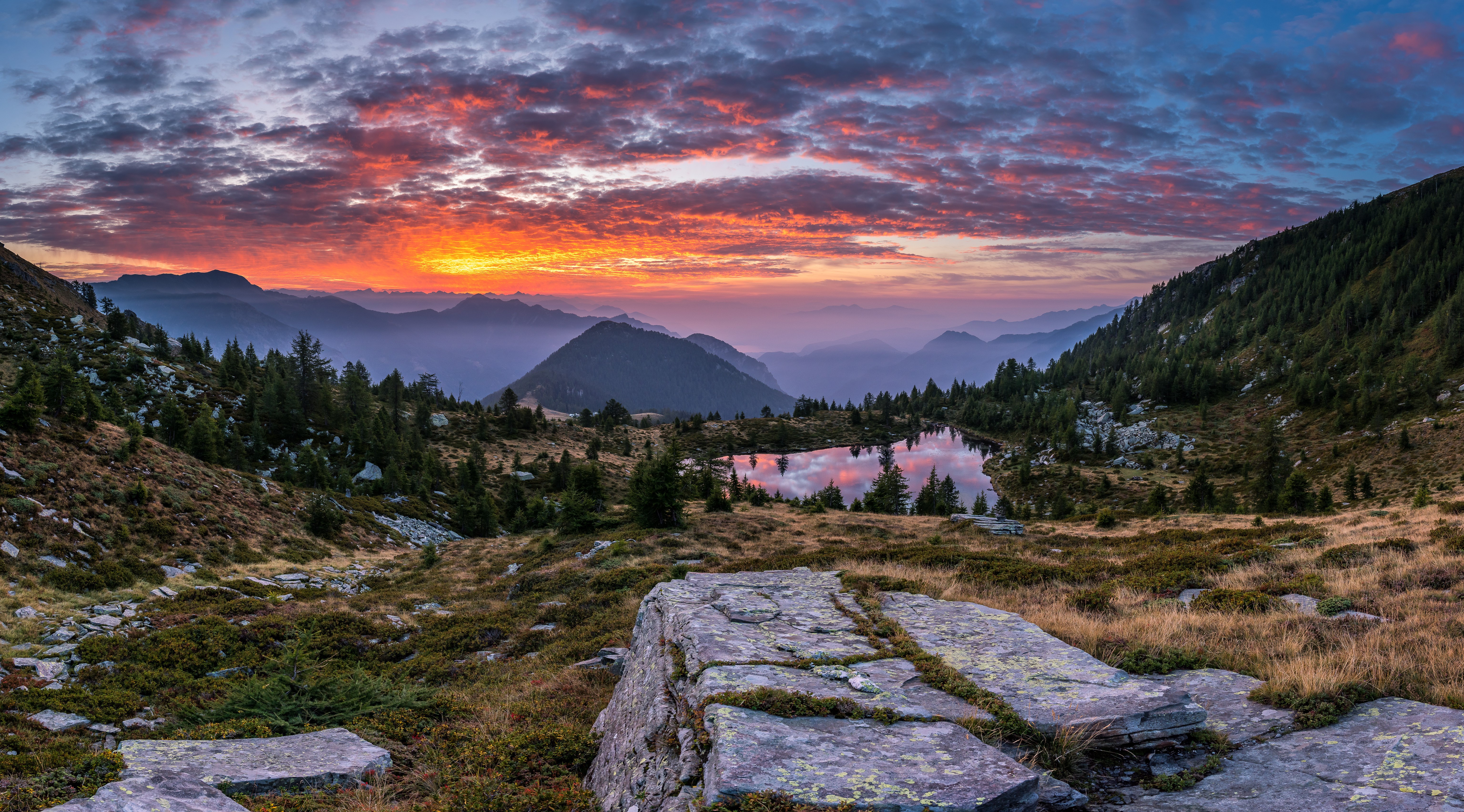 Sunset over a mountain lake in Ticino, Switzerland HD Wallpaper