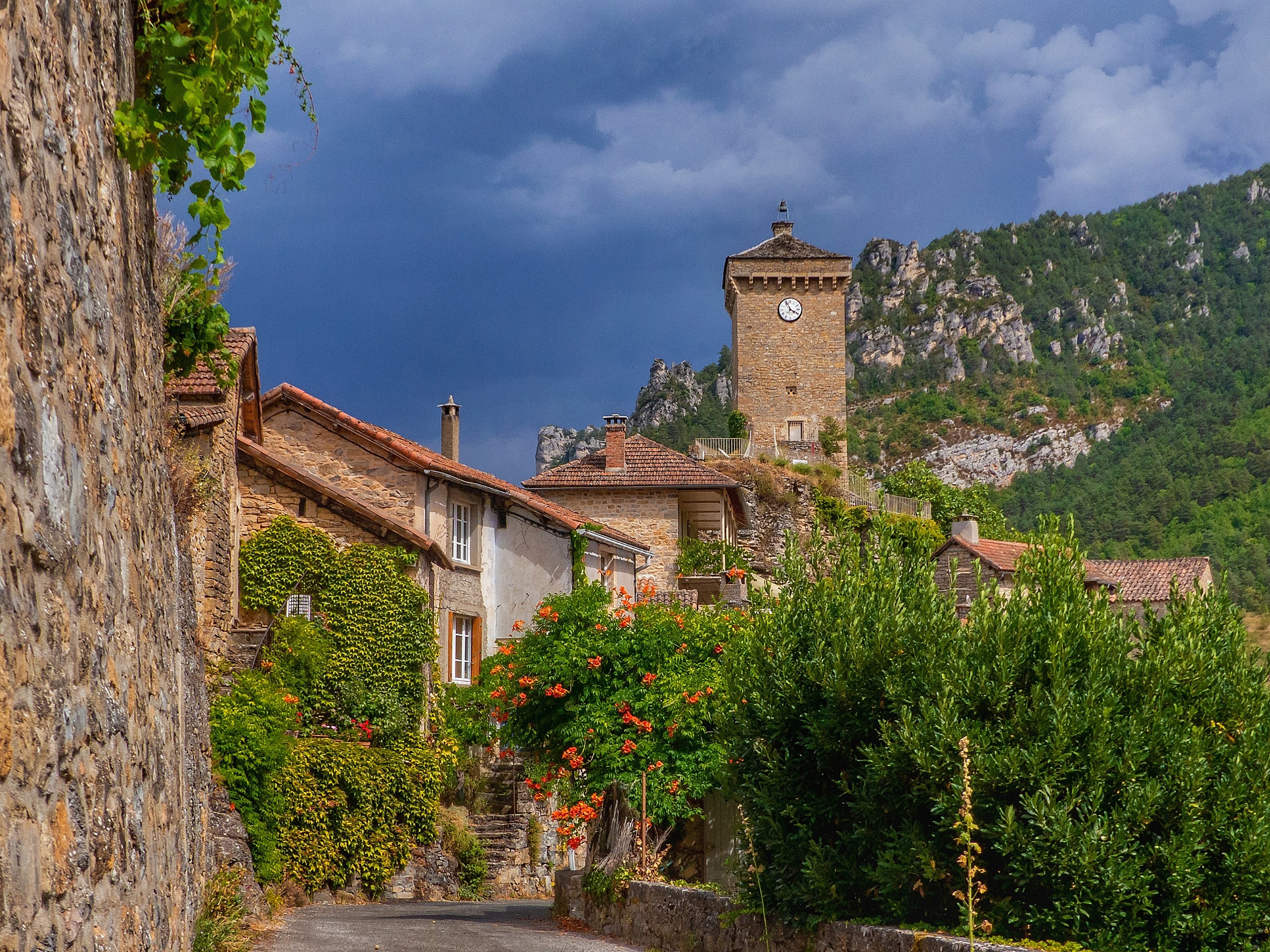 Clock tower in Peyreleau, Aveyron, France HD Wallpaper
