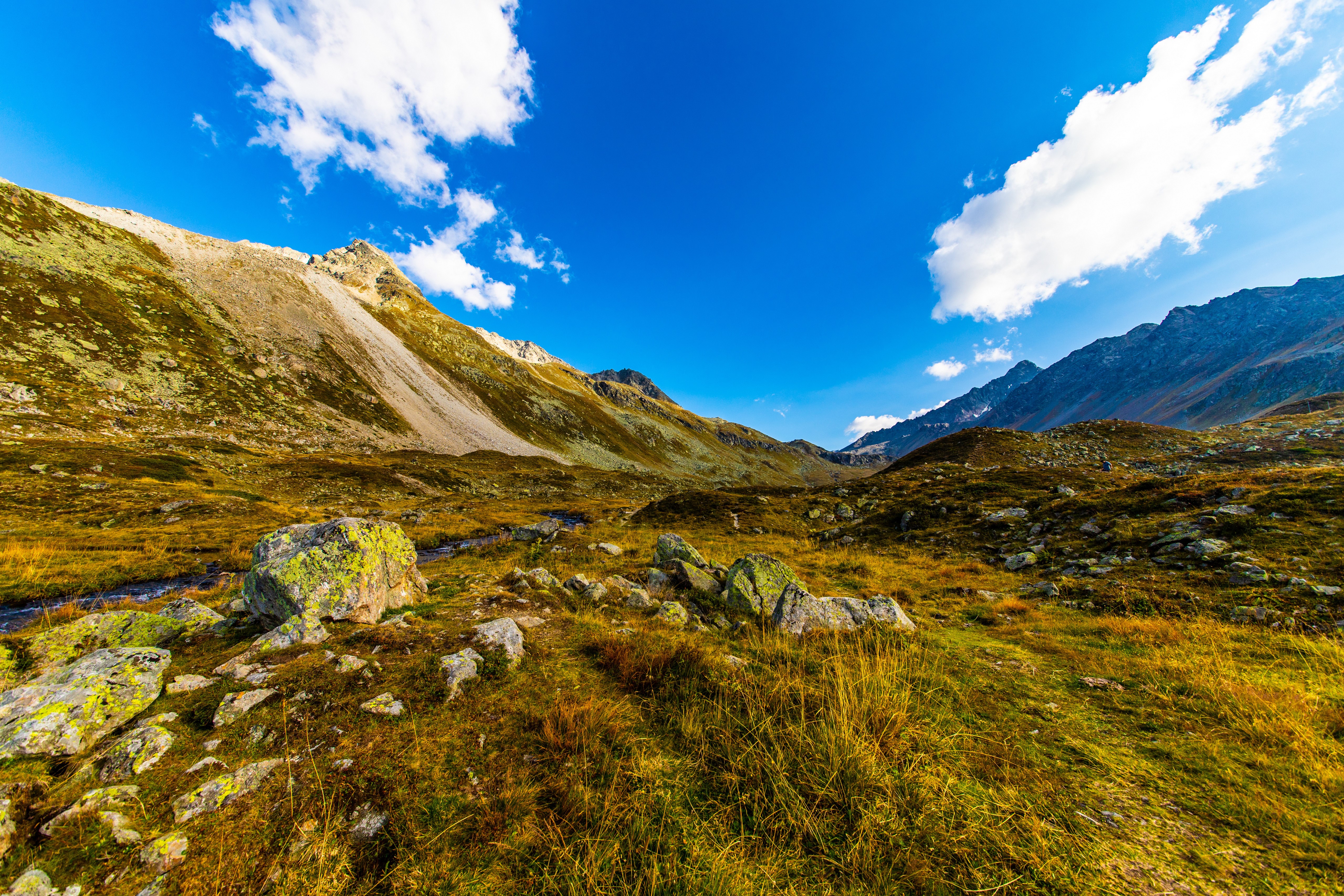 Switzerland Mountains with Grass and Stones HD Wallpaper