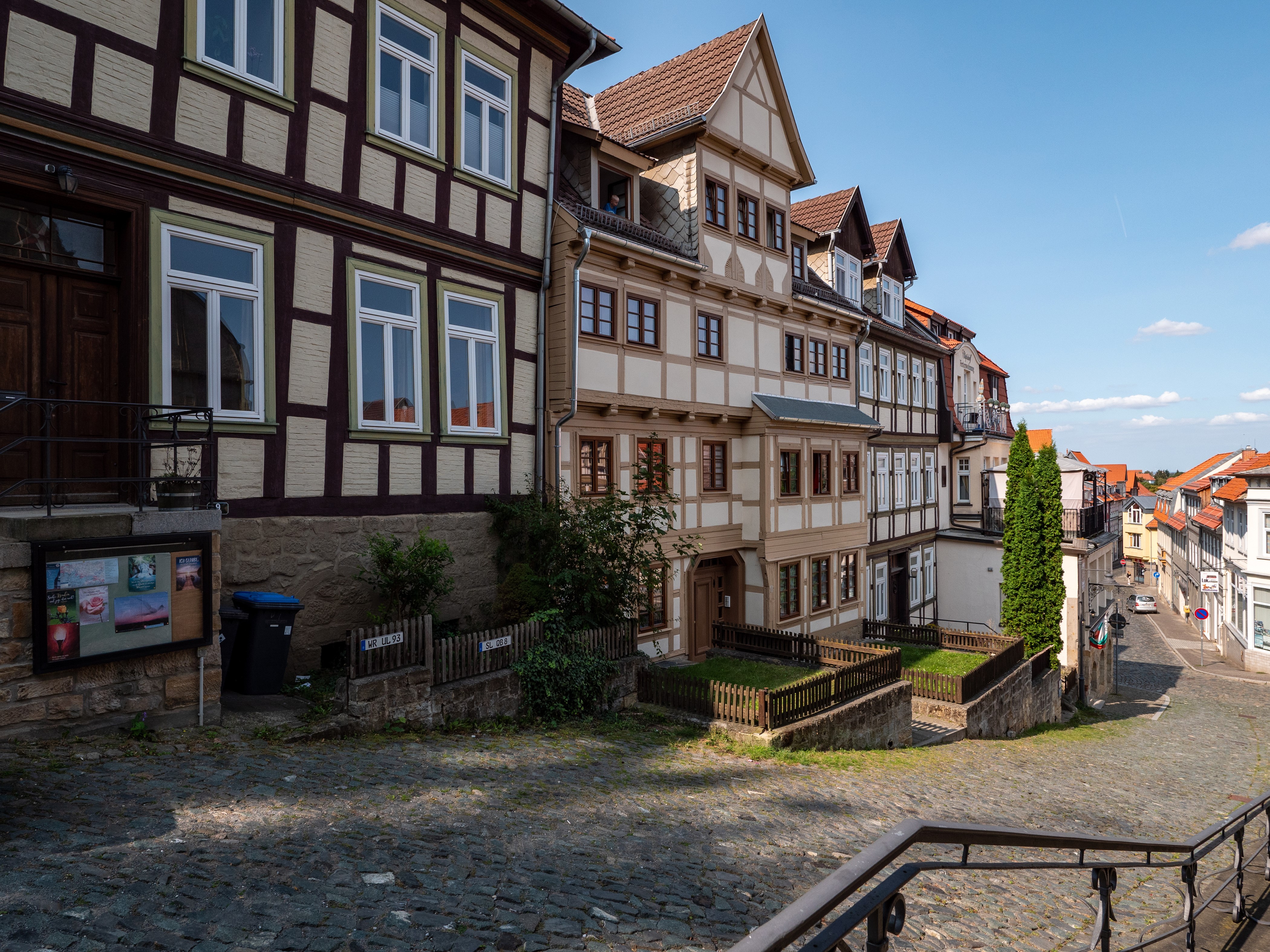 Half-timbered houses on a cobblestone street in Blankenburg (Harz), Germany HD Wallpaper