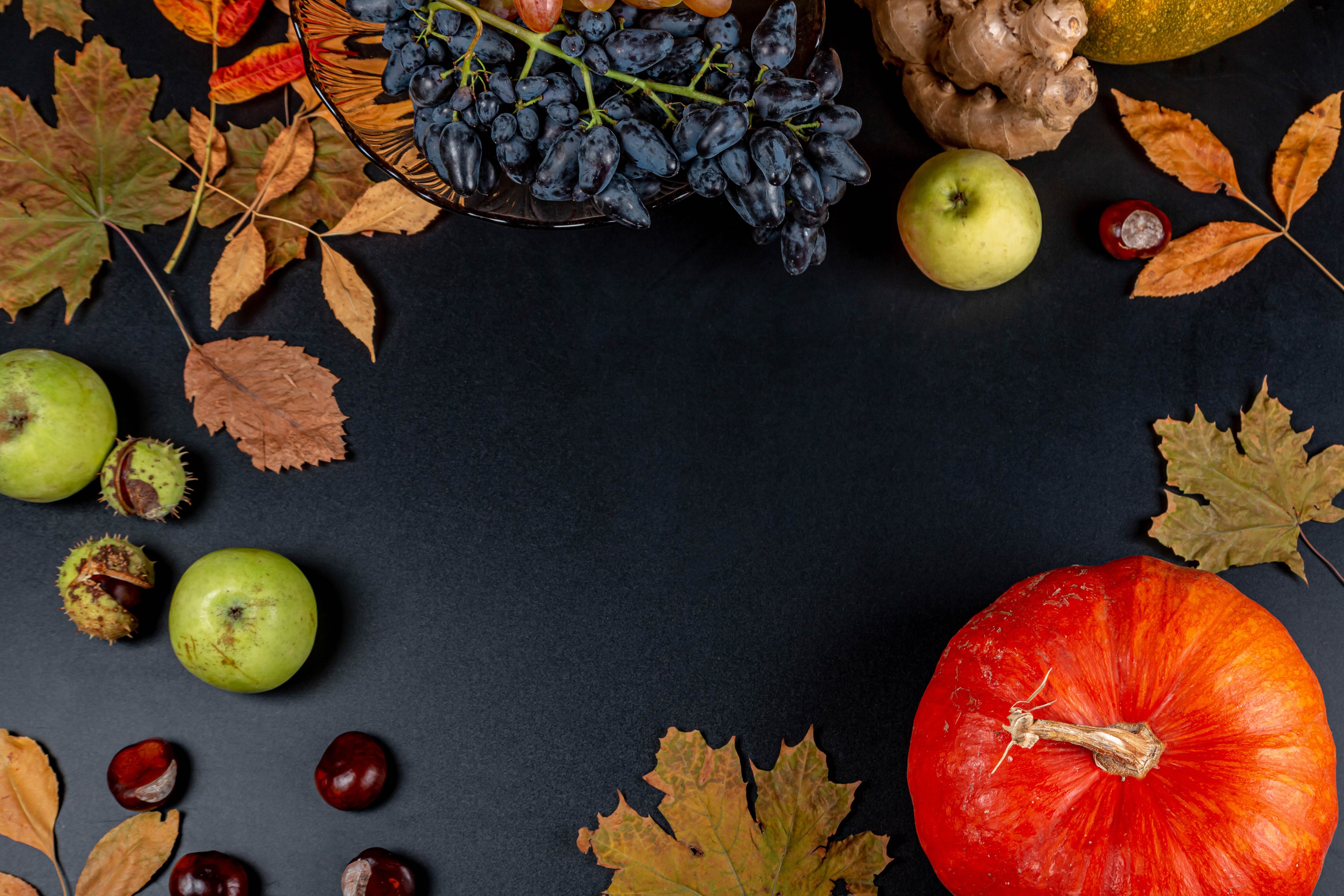 Autumn Harvest: Pumpkin, Grapes, Apples, and Leaves HD Wallpaper