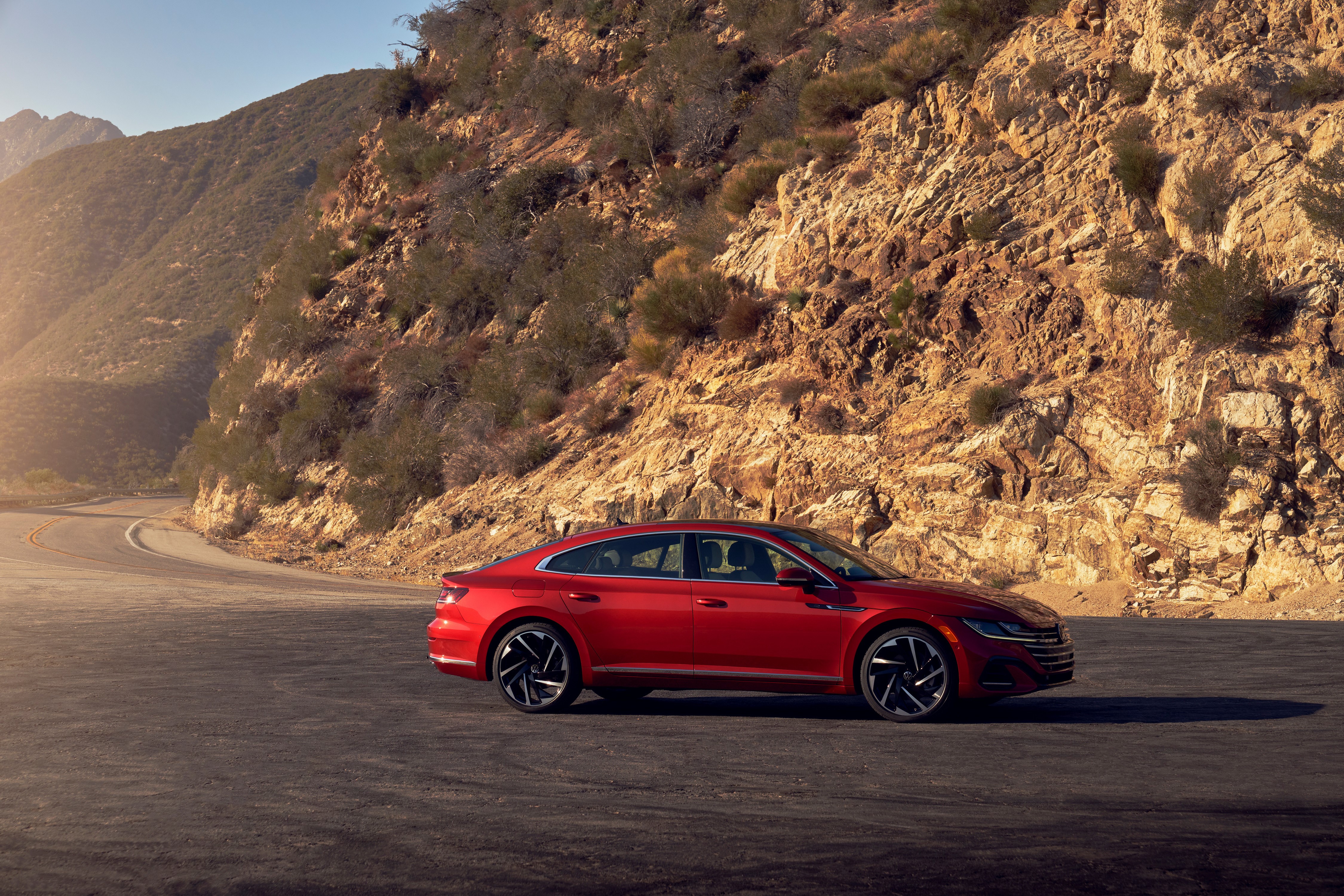 Red Volkswagen Arteon 4MOTION R-Line on a Mountain Road HD Wallpaper