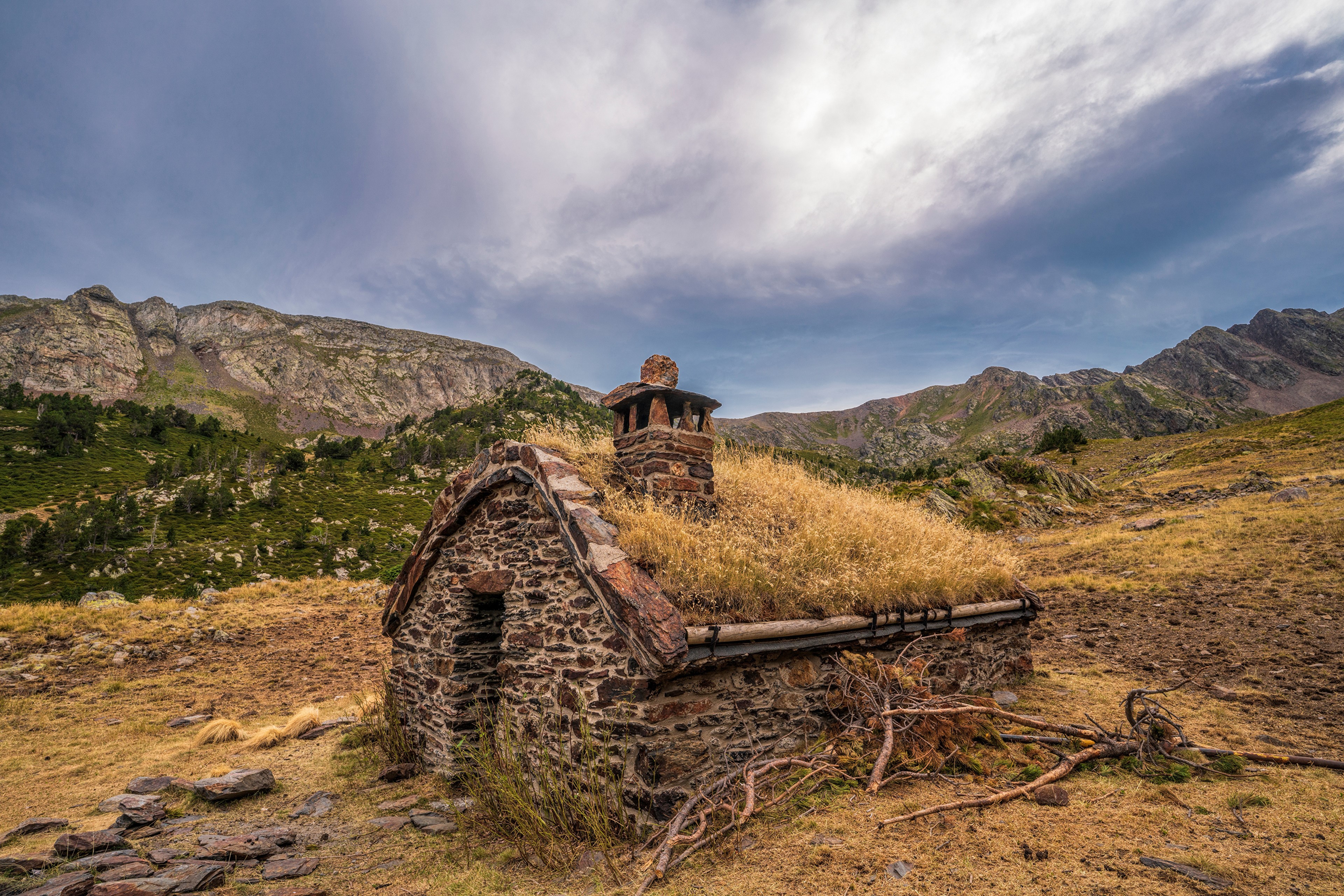 Stone house with grass roof in Coma Pedrosa National Park, Andorra HD Wallpaper